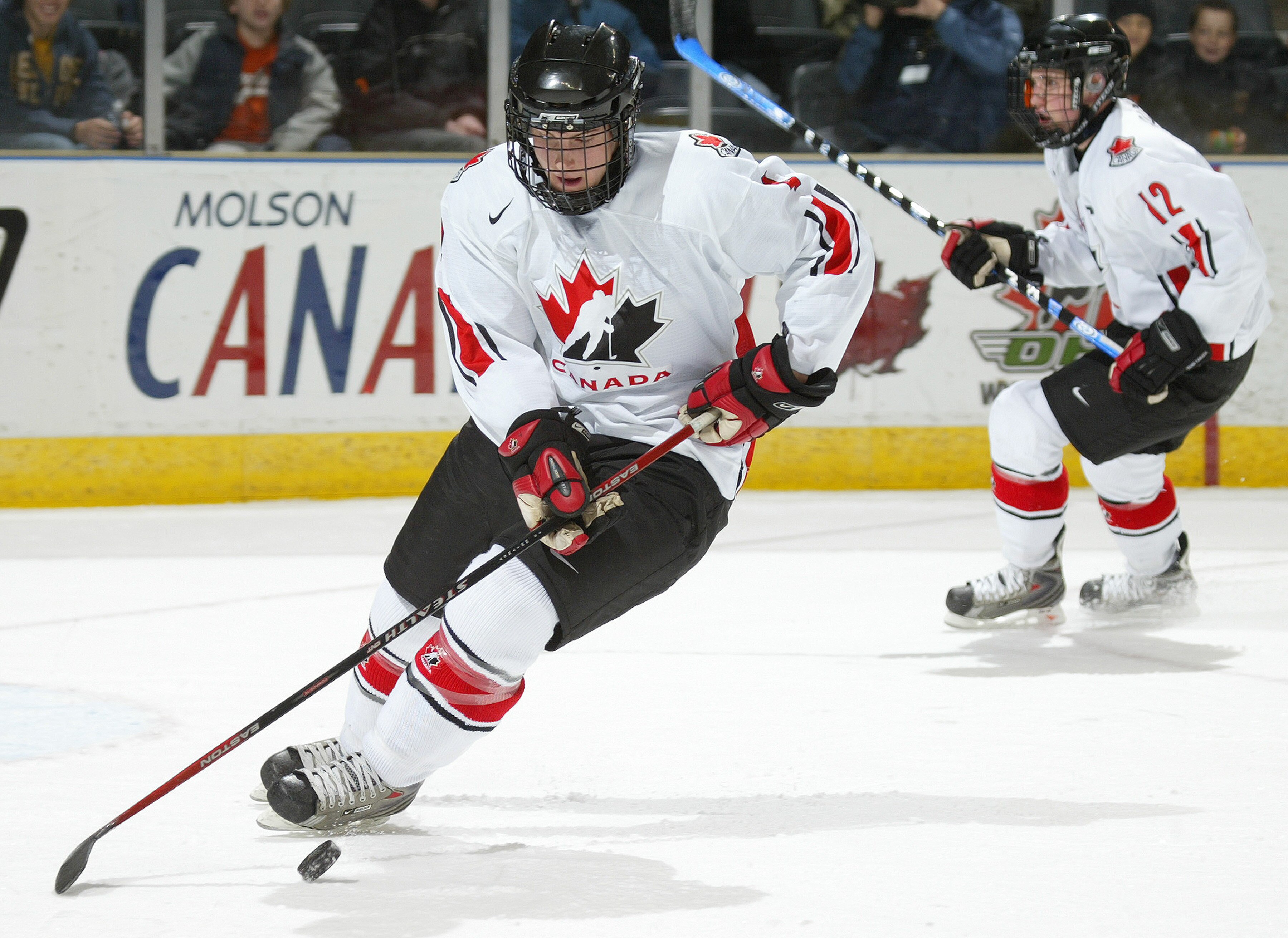 LONDON,ON - JANUARY 3:  Tyson Barrie #4 of team Pacific tries to control the puck in a game against Team USA on January 3, 2008 at the John Labatt Centre in London, Ontario. Team USA defeated Team Pacific 3-2 and earned a spot in the gold medal game again