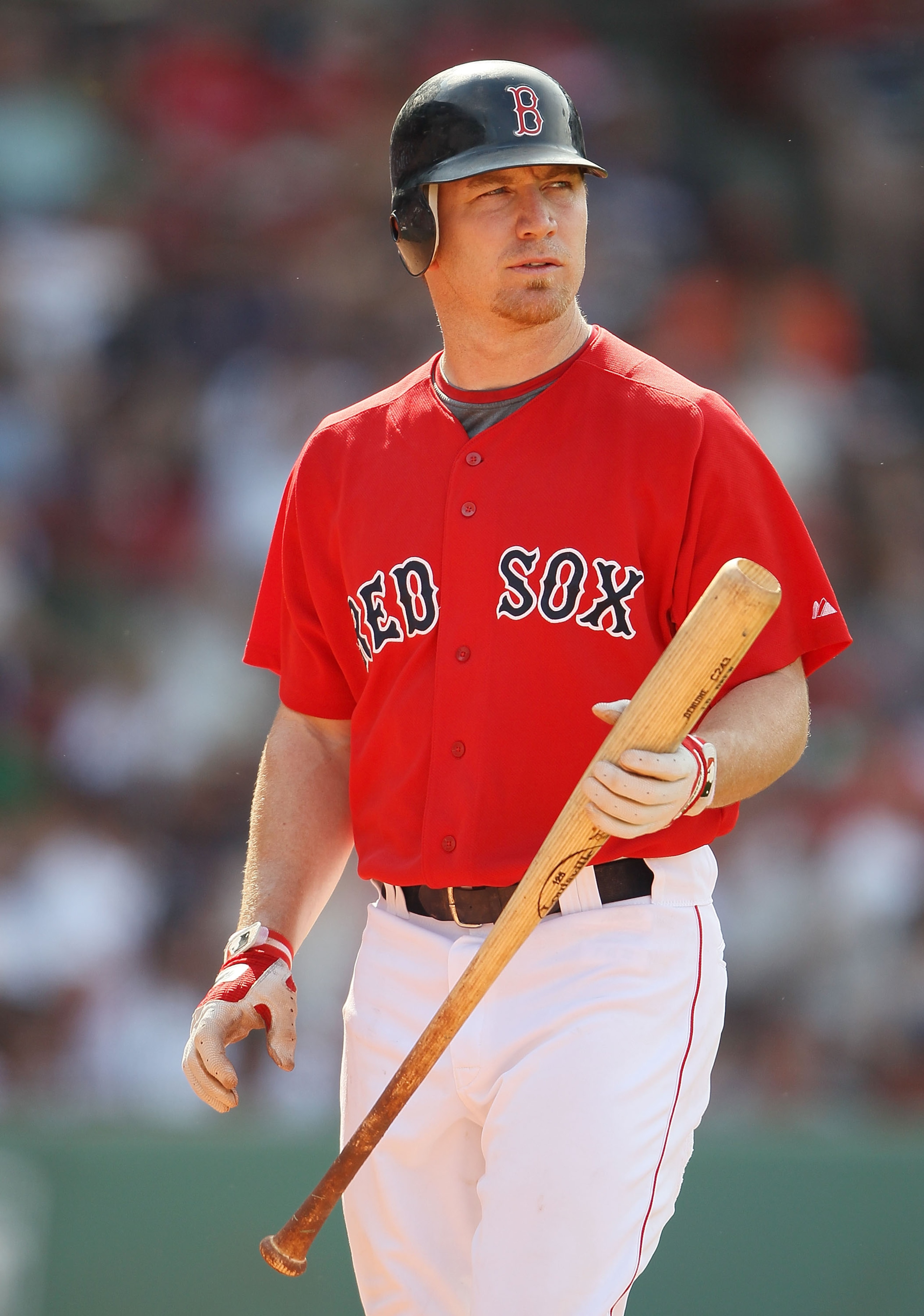 BOSTON - JULY 04:  J.D. Drew #7 of the Boston Red Sox heads back to the dugout after striking out against the Baltimore Orioles on July 4, 2010 at Fenway Park in Boston, Massachusetts. The Orioles defeated the Red Sox 6-1.  (Photo by Elsa/Getty Images)
