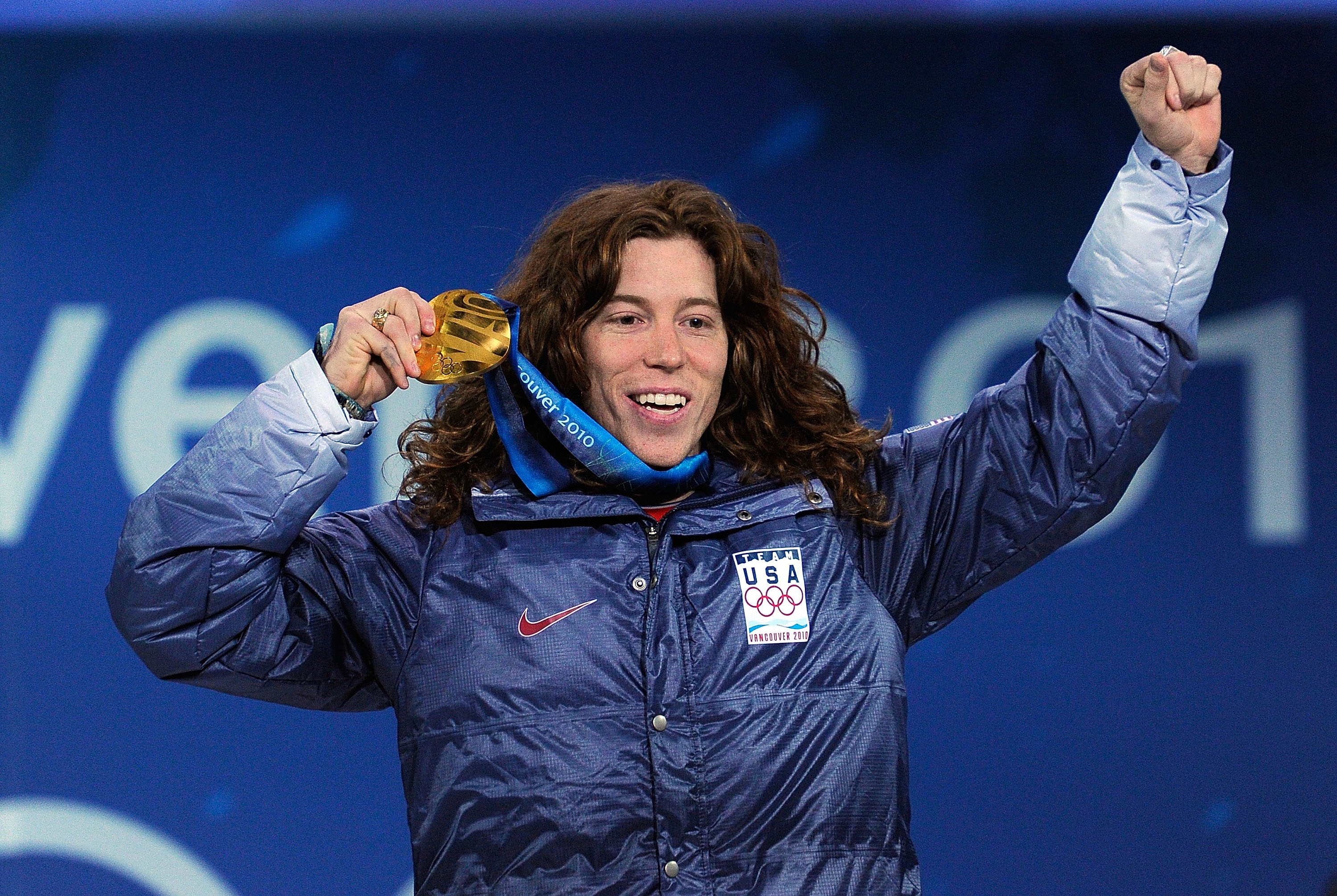 VANCOUVER, BC - FEBRUARY 18:  Shaun White of United States celebrates his gold medal during the medal ceremony for the Menï¿½s Halfpipe on day 7 of the Vancouver 2010 Winter Olympics at BC Place on February 18, 2010 in Vancouver, Canada.  (Photo by Kevork D