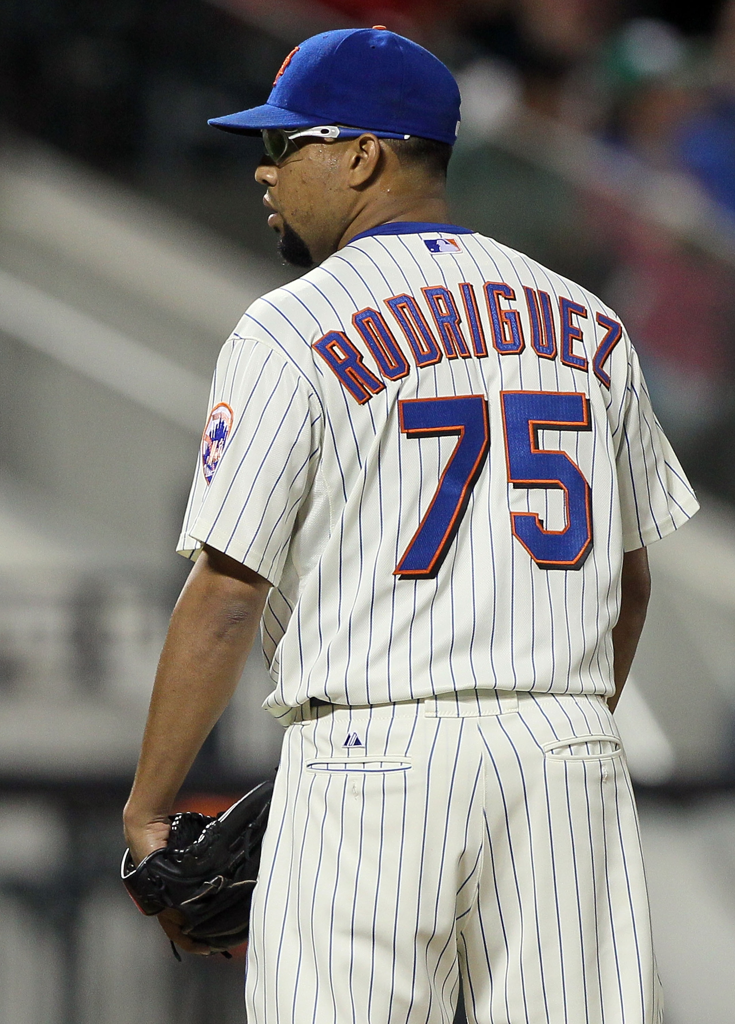 NEW YORK - AUGUST 14:  Francisco Rodriguez #75 of the New York Mets looks on after pitching in the ninth inning against the Philadelphia Phillies on August 14, 2010 at Citi Field in the Flushing neighborhood of the Queens borough of New York City. The Phi