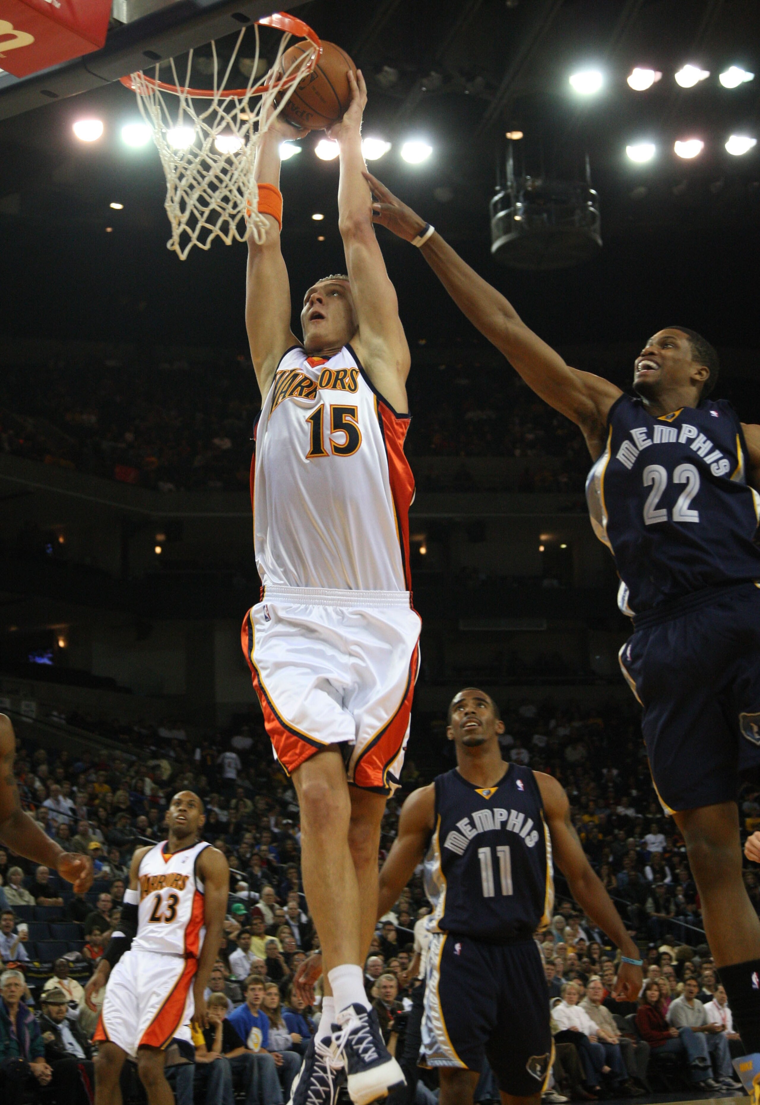 OAKLAND, CA - NOVEMBER 07:   Andris Biedrins #15 of the Golden State Warriors shoots over Rudy Gay #22 of the Memphis Grizzlies during an NBA game on November 7, 2008 at Oracle Arena in Oakland, California. NOTE TO USER: User expressly acknowledges and ag