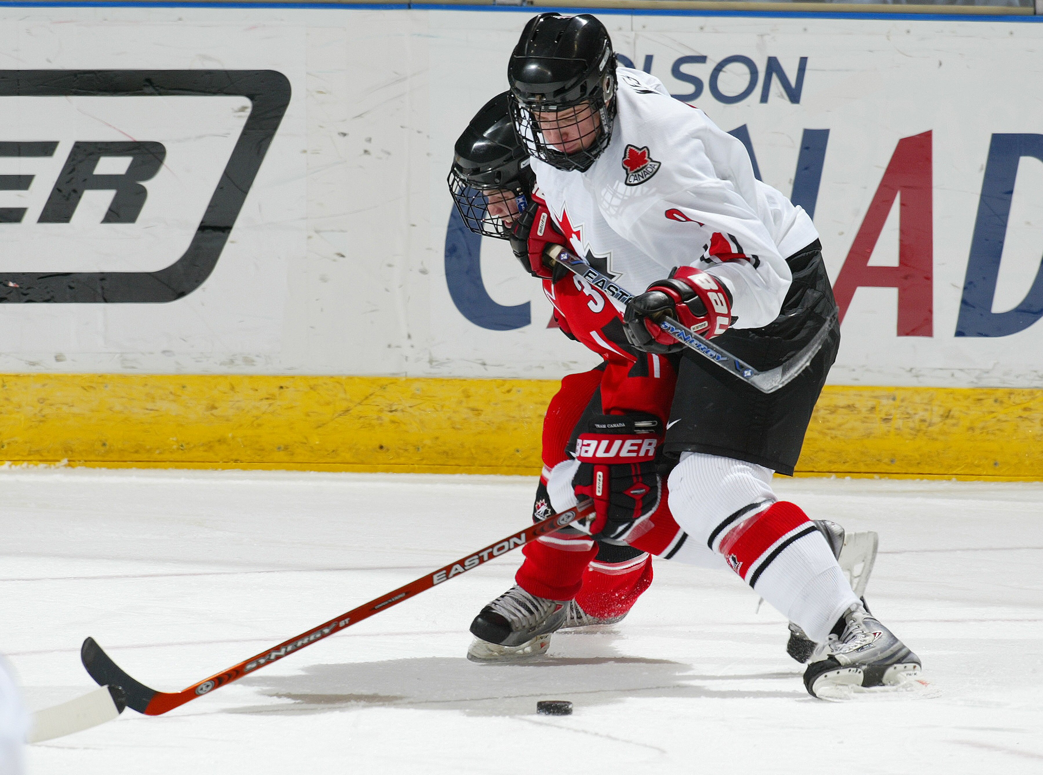 LONDON,ON - JANUARY 3:  Carter Ashton #9 of Team Ontario tries to muscle his way past Ryan Ellis #3 of Team Ontario in a game on January 3, 2008 at the John Labatt Centre in London, Ontario. Team Ontario defeated Team West 4-3 to earn a spot in the gold m