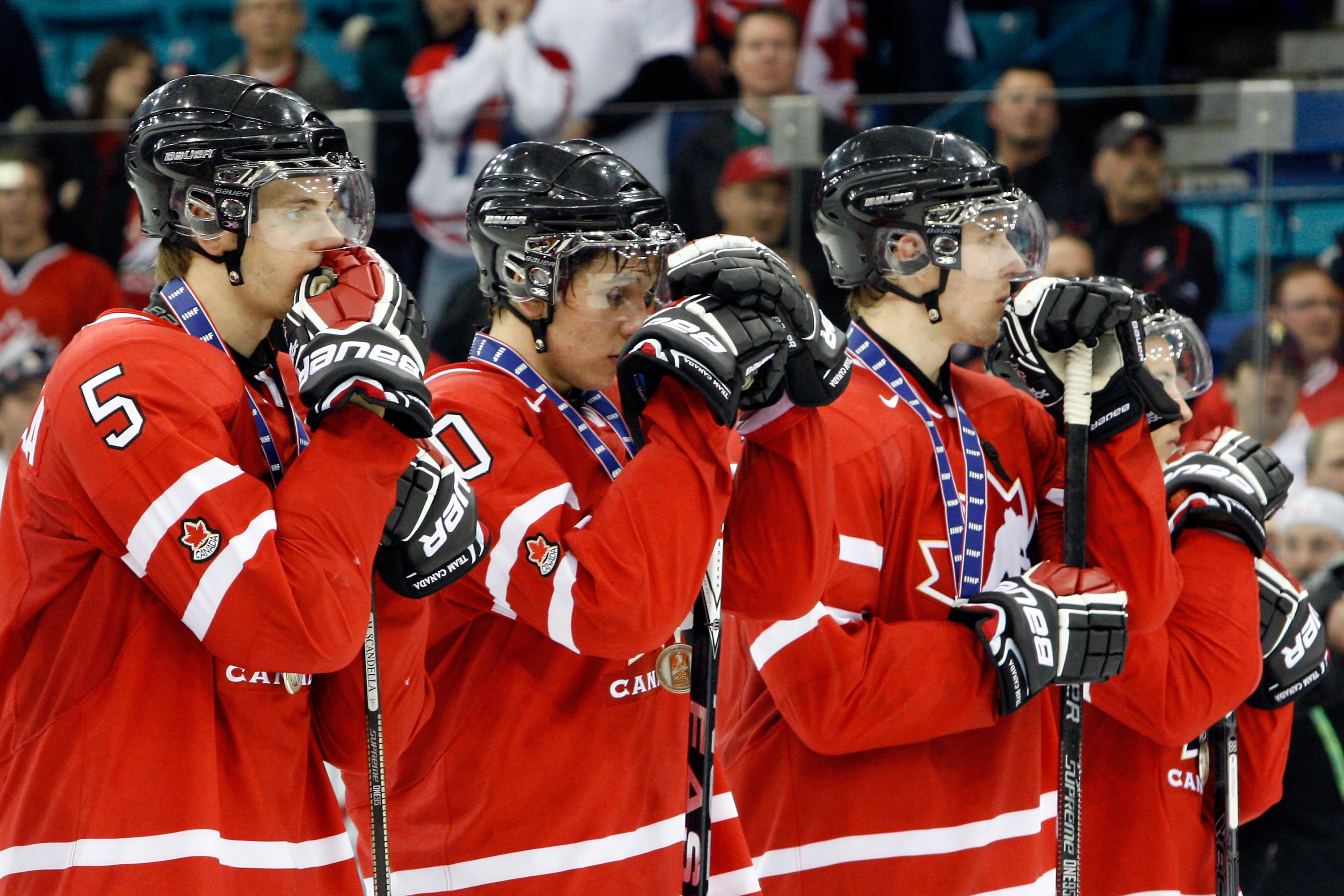 SASKATOON, SK - JANUARY 5:  Members of Team Canada stand dejected after being defeated by Team USA at the 2010 IIHF World Junior Championship Tournament Gold Medal game on January 5, 2010 at the Credit Union Centre in Saskatoon, Saskatchewan, Canada.  Tea
