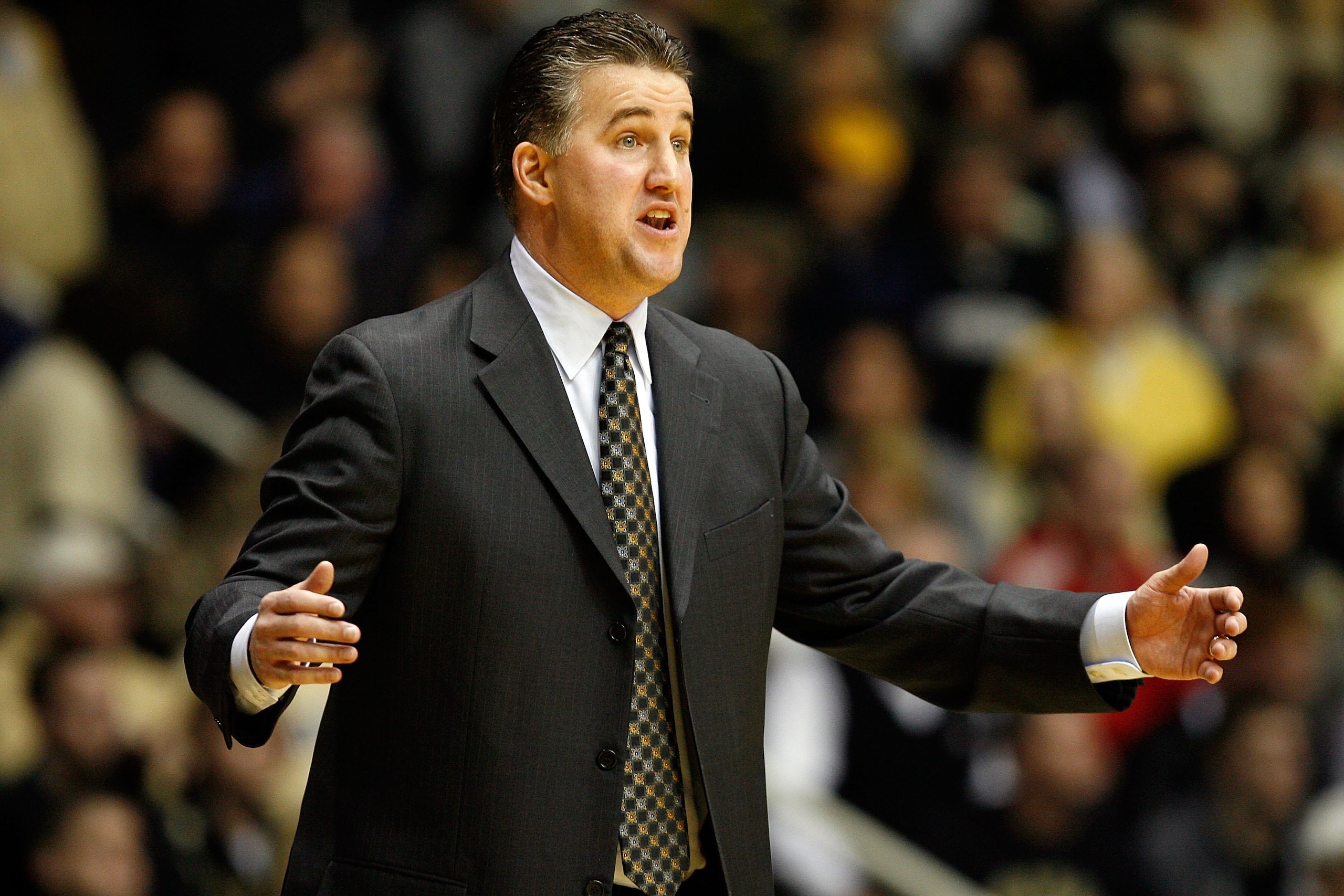 WEST LAFAYETTE, IN - JANUARY 12:  Matt Painter the Head Coach of the Purdue Boilermakers gives instructions to his team during the Big Ten game against the Ohio State Buckeyes at Mackey Arena on January 12, 2010 in West Lafayette, Indiana. Ohio State won