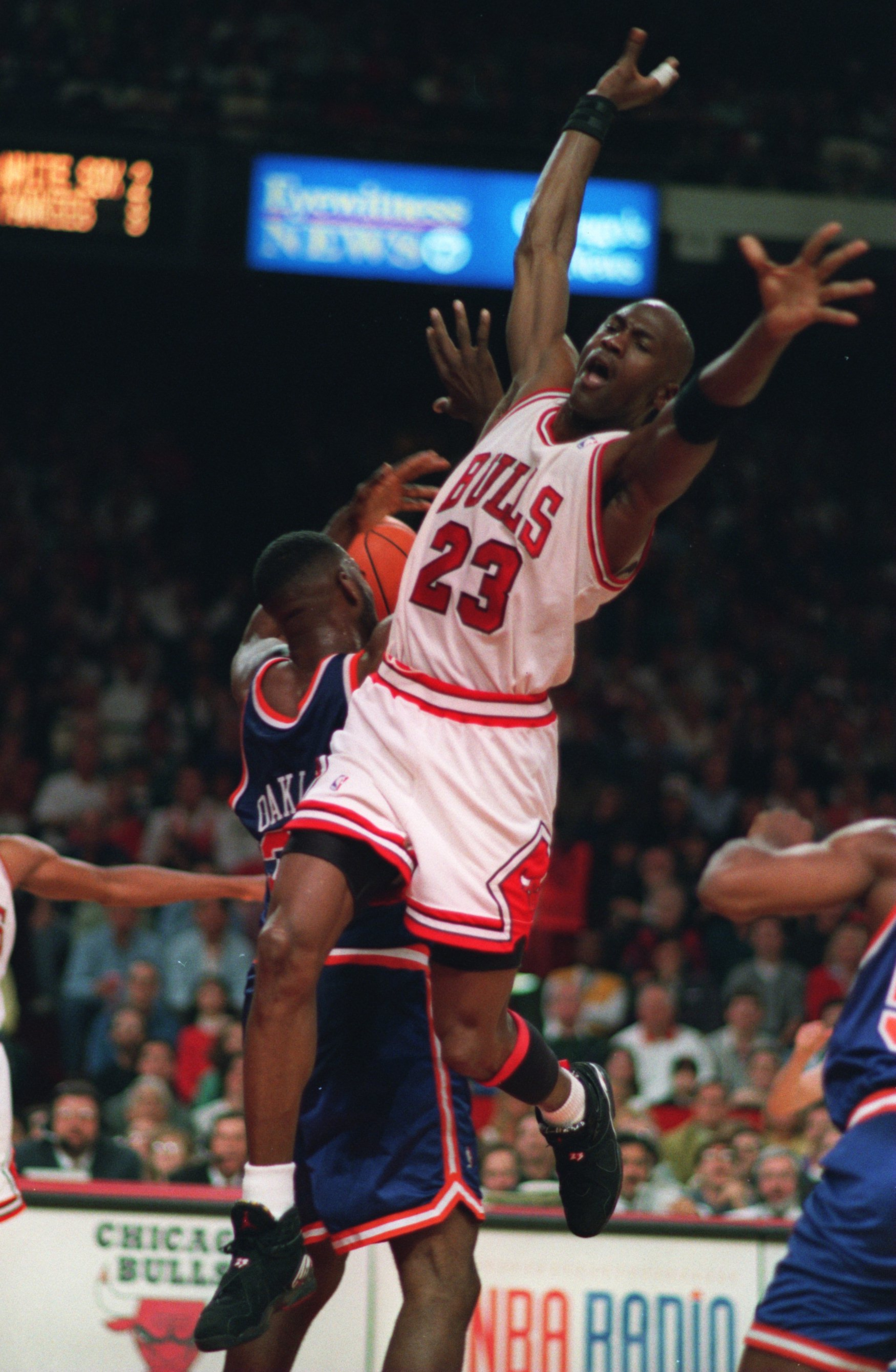CHICAGO BULLS GUARD MICHAEL JORDAN LEAPS UP TO DEFEND AN INBOUNDS PASS DURING THEIR 103-83 EASTERN CONFERENCE FINAL WIN OVER THE NEW YORK KNICKS AT CHICAGO STADIUM IN CHICAGO, ILLINOIS.