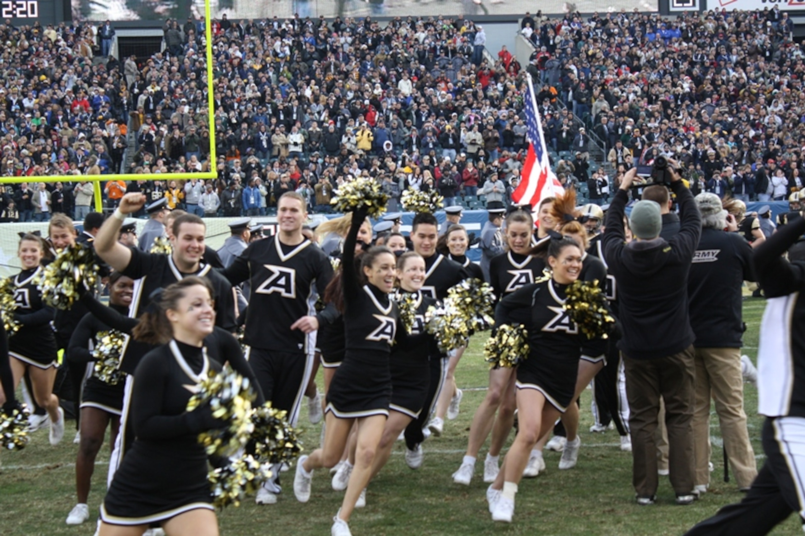 Army Cheer leaders Enter the Field