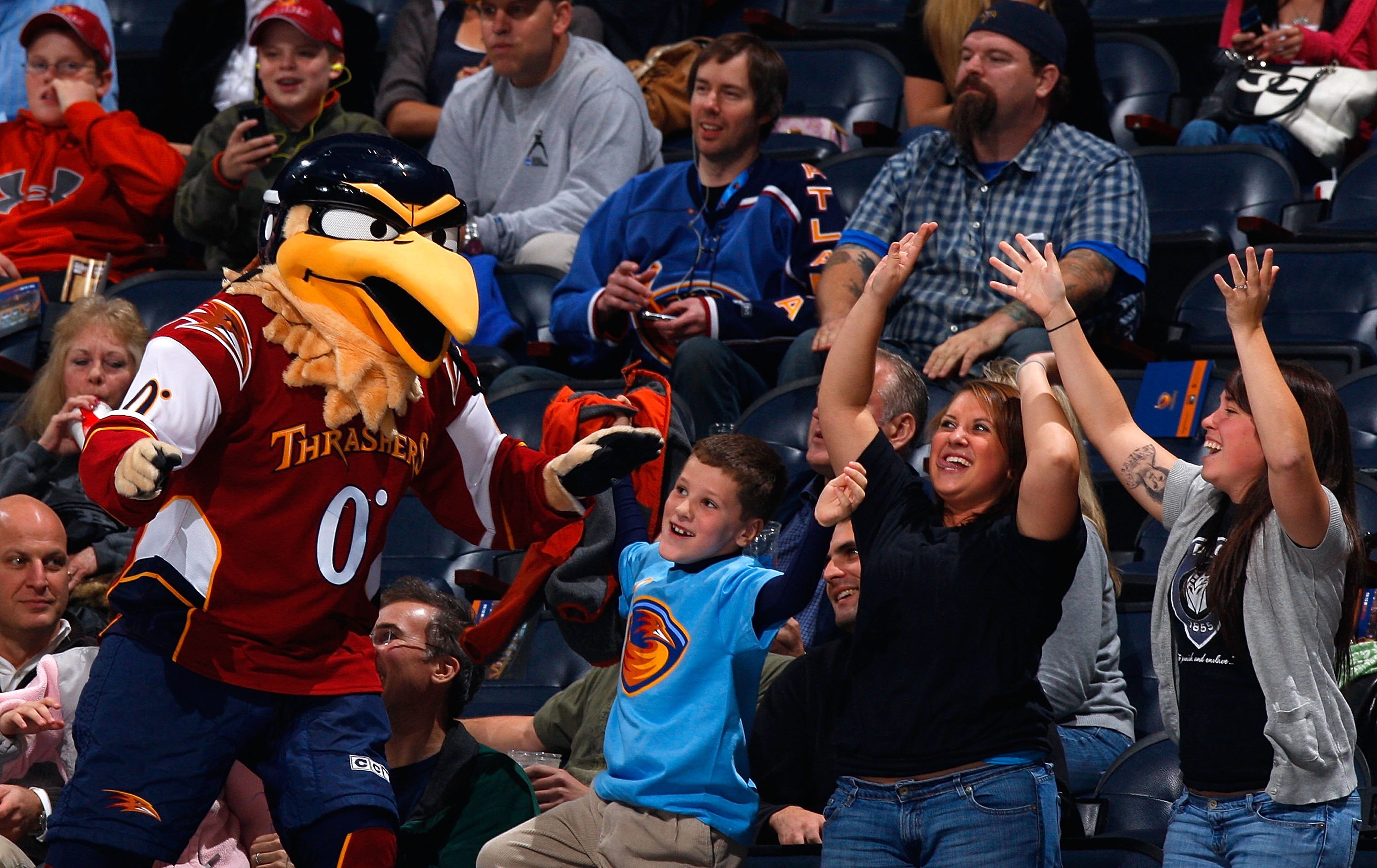 ATLANTA - OCTOBER 22:  Thrash, mascot of the Atlanta Thrashers, dances with fans during the game against the Washington Capitals at Philips Arena on October 22, 2009 in Atlanta, Georgia.  (Photo by Kevin C. Cox/Getty Images)