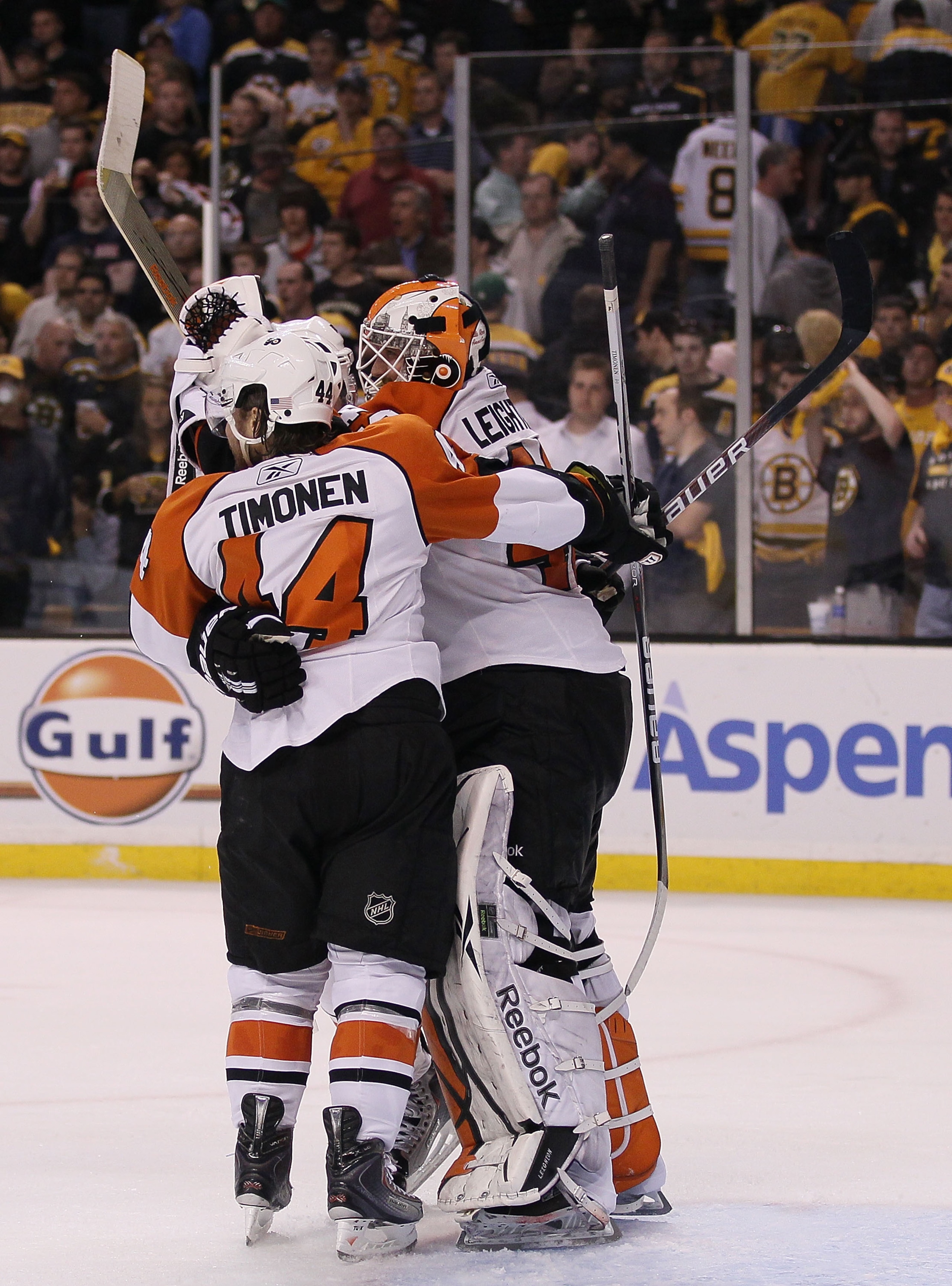 BOSTON - MAY 14:  Kimmo Timonen #44 and Mike Richards #18 of the Philadelphia Flyers celebrates the win with goalie Michael Leighton #49 after defeated the Boston Bruins in Game Seven of the Eastern Conference Semifinals during the 2010 NHL Stanley Cup Pl
