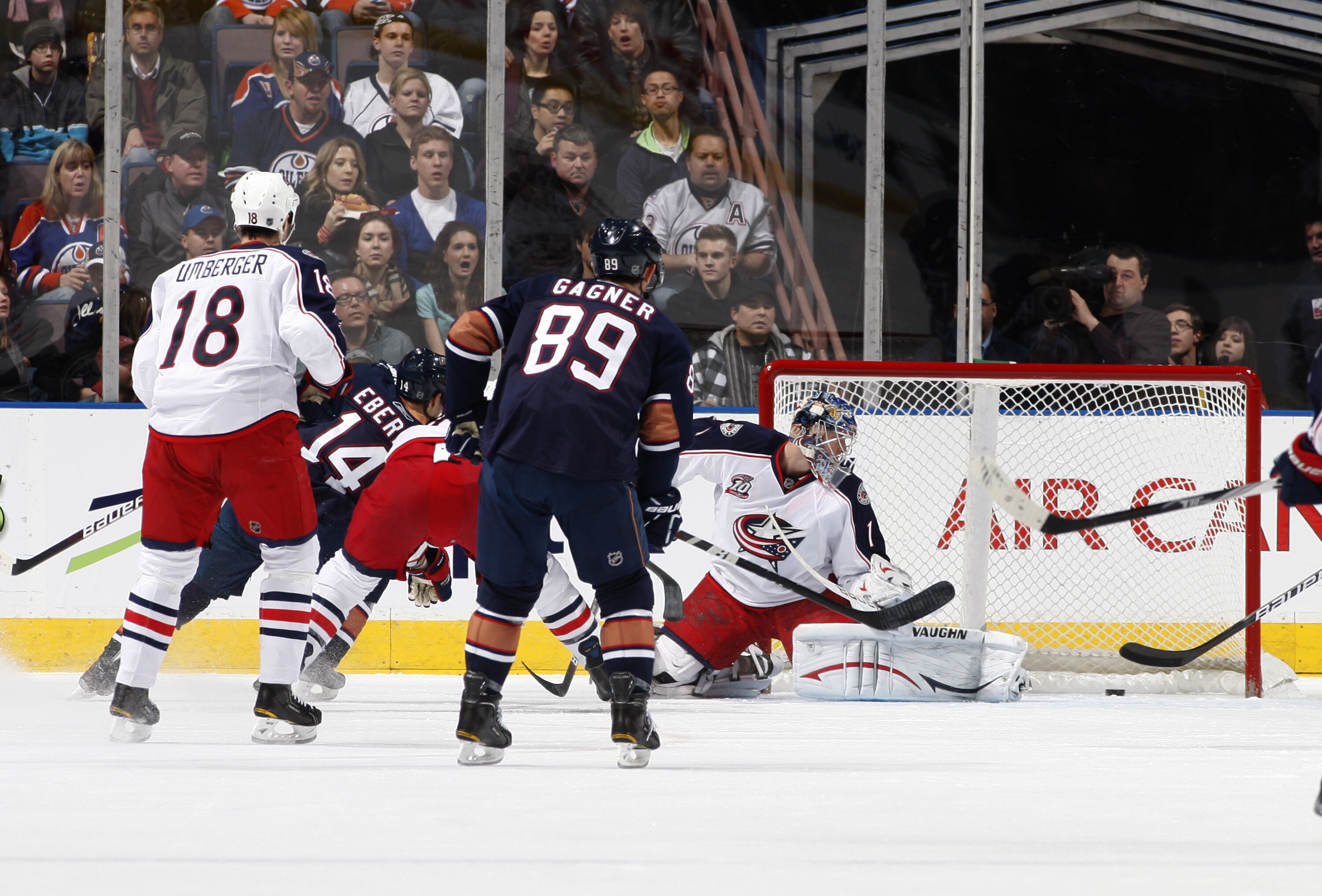 EDMONTON, CANADA - DECEMBER 16: Jordan Eberle #14 of the Edmonton Oilers scores against Steve Mason #1 of the Columbus Blue Jackets at Rexall Place December 16, 2010 in Edmonton, Alberta, Canada. (Photo by Dale MacMillan/Getty Images)