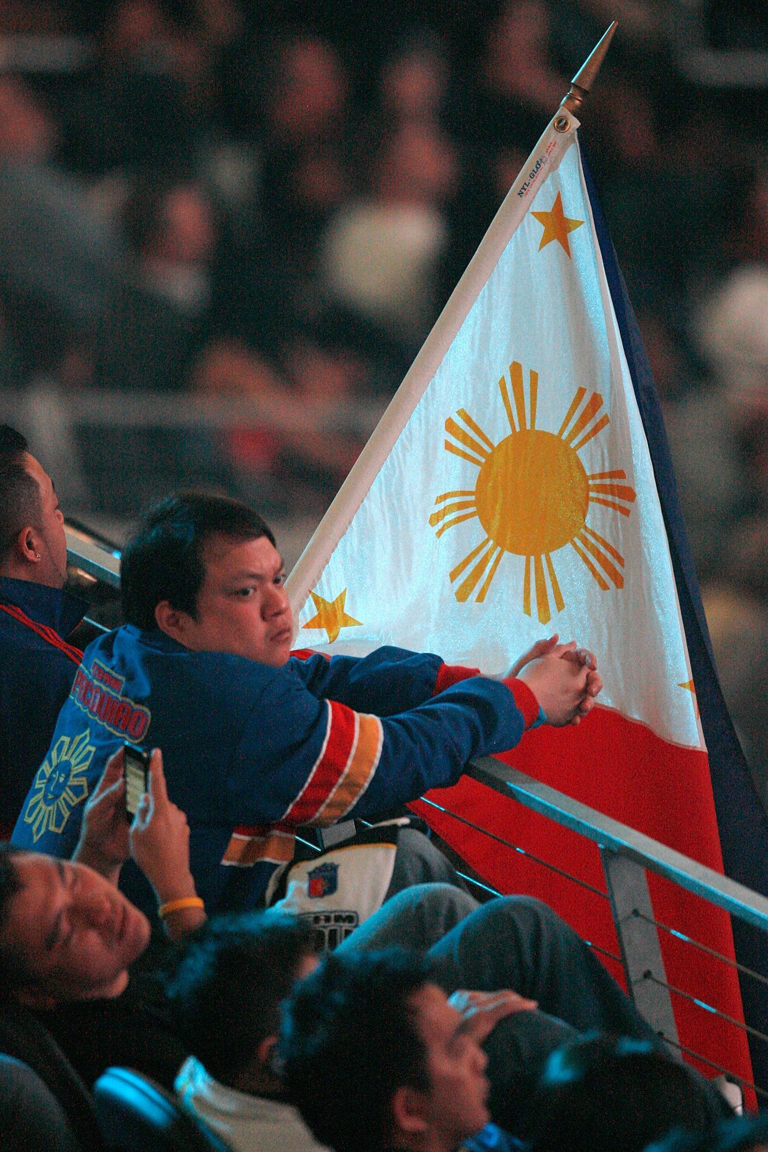 ARLINGTON, TX - MARCH 13:  A fan of Manny Pacquiao of the Philippines waits for Pacquiao to take on Joshua Clottey of Ghana before the WBO welterweight title fight at Cowboys Stadium on March 13, 2010 in Arlington, Texas. Pacquiao defeated Clottey by unan