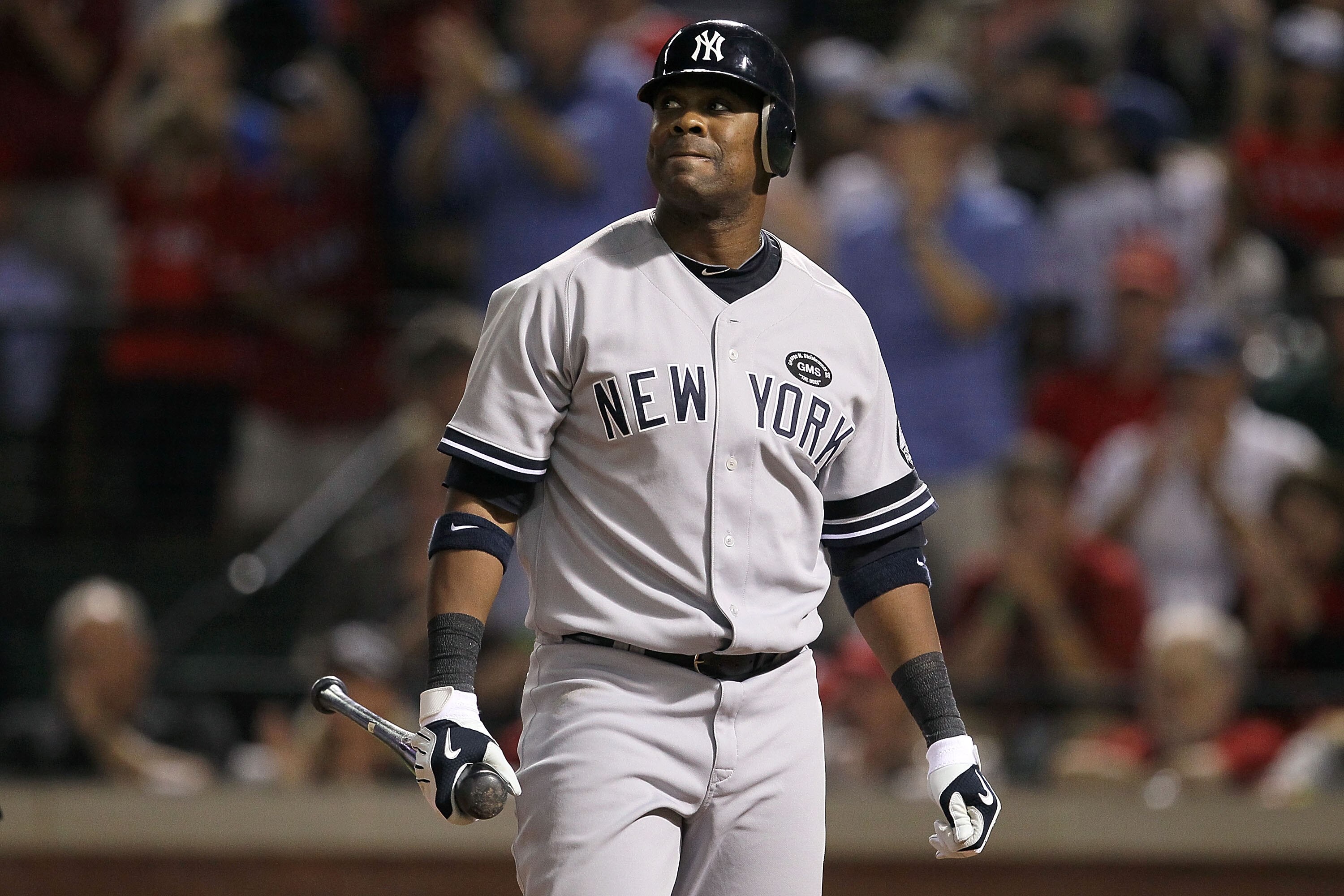 ARLINGTON, TX - OCTOBER 22:  Marcus Thames #38 of the New York Yankees reacts after striking out against the Texas Rangers in Game Six of the ALCS during the 2010 MLB Playoffs at Rangers Ballpark in Arlington on October 22, 2010 in Arlington, Texas.  (Pho