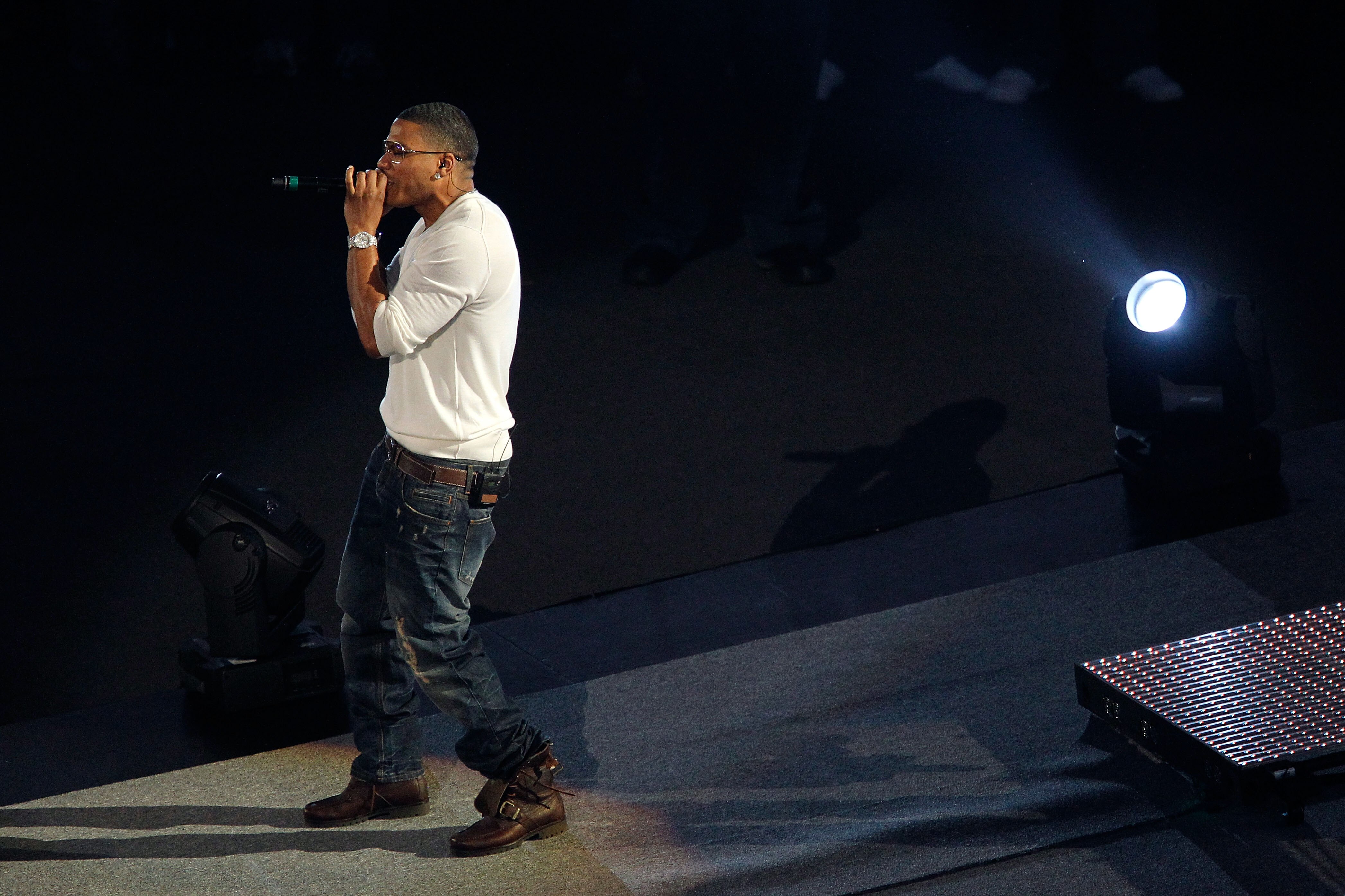 ARLINGTON, TX - NOVEMBER 13: Recording artist Nelly performs prior to Manny Pacquiao of the Philippines fighting against Antonio Margarito (black trunks) of Mexico during their WBC World Super Welterweight Title bout at Cowboys Stadium on November 13, 201