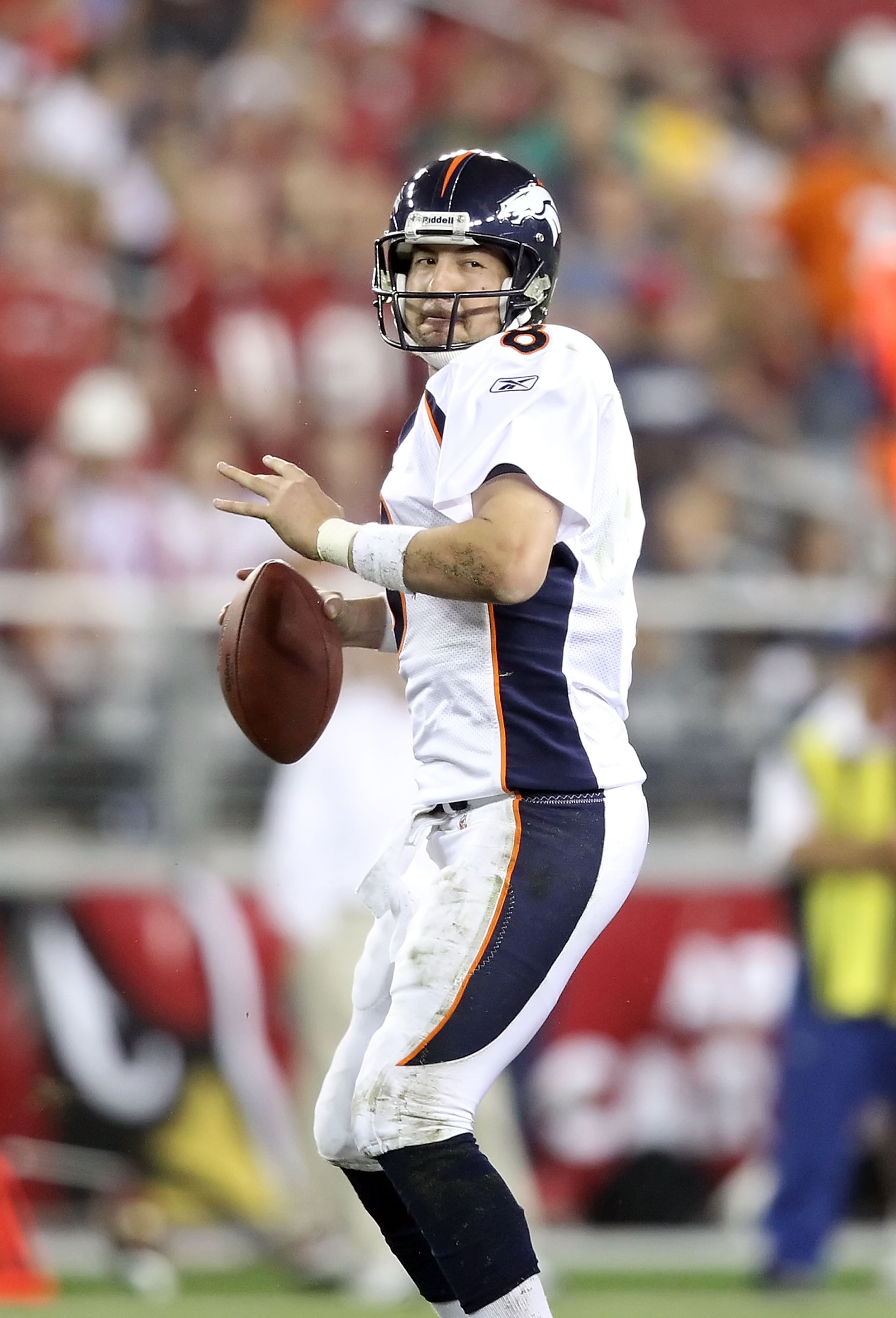 GLENDALE, AZ - DECEMBER 12:  Quarterback Kyle Orton #8 of the Denver Broncos drops back to pass during the NFL game against the Arizona Cardinals at the University of Phoenix Stadium on December 12, 2010 in Glendale, Arizona.  The Cardinals defeated the B