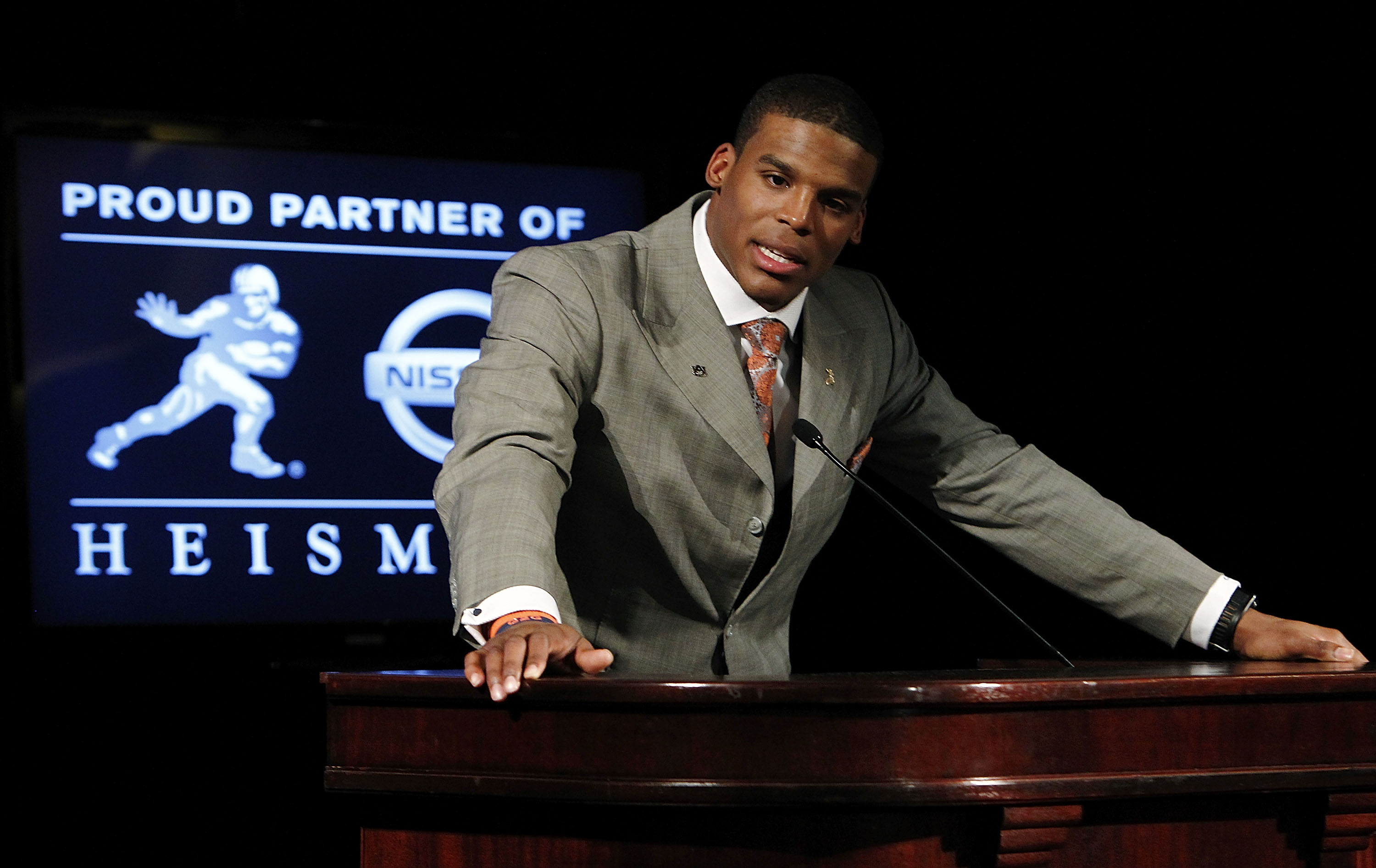 NEW YORK - DECEMBER 11:  Cam Newton, quarterback of the Auburn University Tigers, speaks after being awarded the 2010 Heisman Memorial Trophy Award on December 11, 2010 in New York City.  (Photo by Jeff Zelevansky/Getty Images)