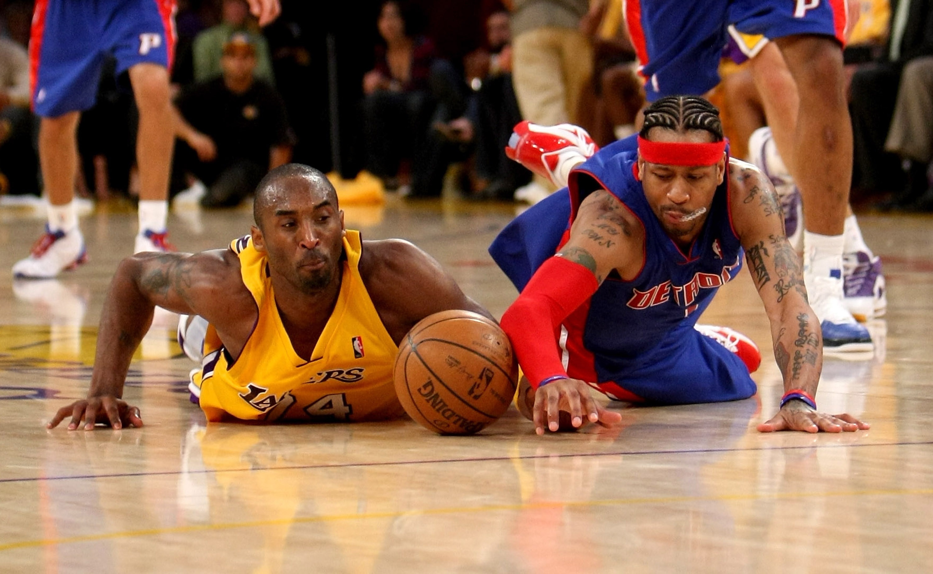 LOS ANGELES, CA - NOVEMBER 14: Kobe Bryant #24 of the Los Angeles Lakers and Allen Iverson #1 of the Detroit Pistons dive for a loose ball on November 14, 2008 at Staples Center in Los Angeles, California. The Pistons won 106-95.   NOTE TO USER: User expr