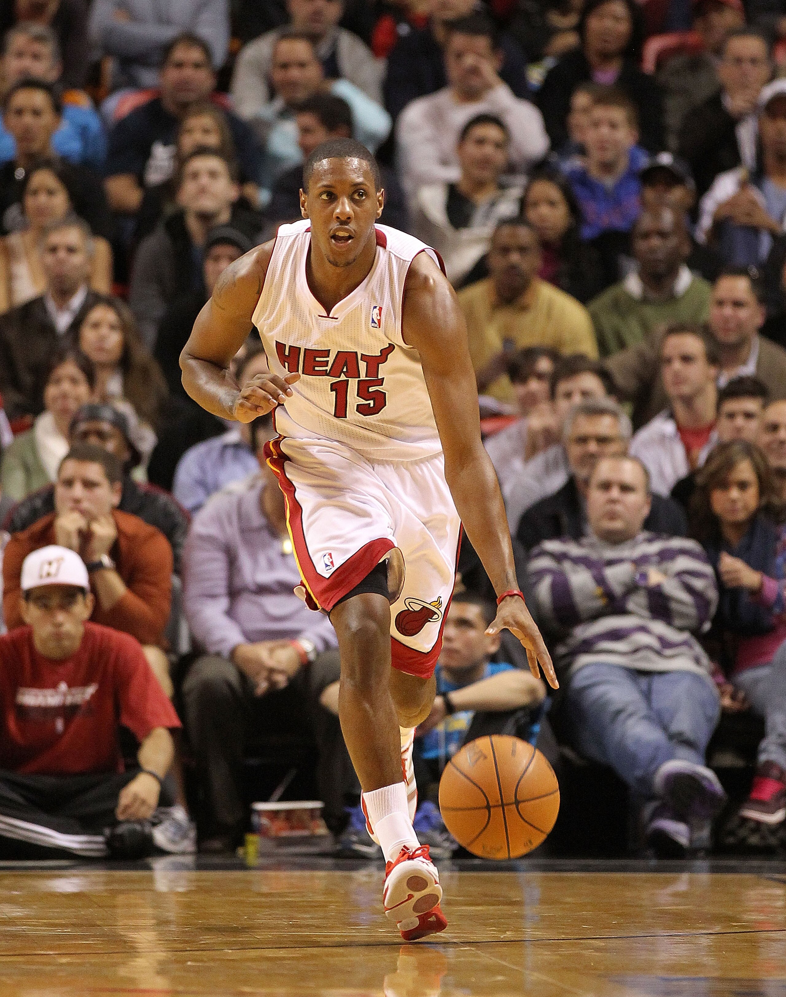 MIAMI, FL - DECEMBER 13:  Mario Chalmers #15 of the Miami Heat brings the ball up the floor during a game against the New Orleans Hornets at American Airlines Arena on December 13, 2010 in Miami, Florida. NOTE TO USER: User expressly acknowledges and agre