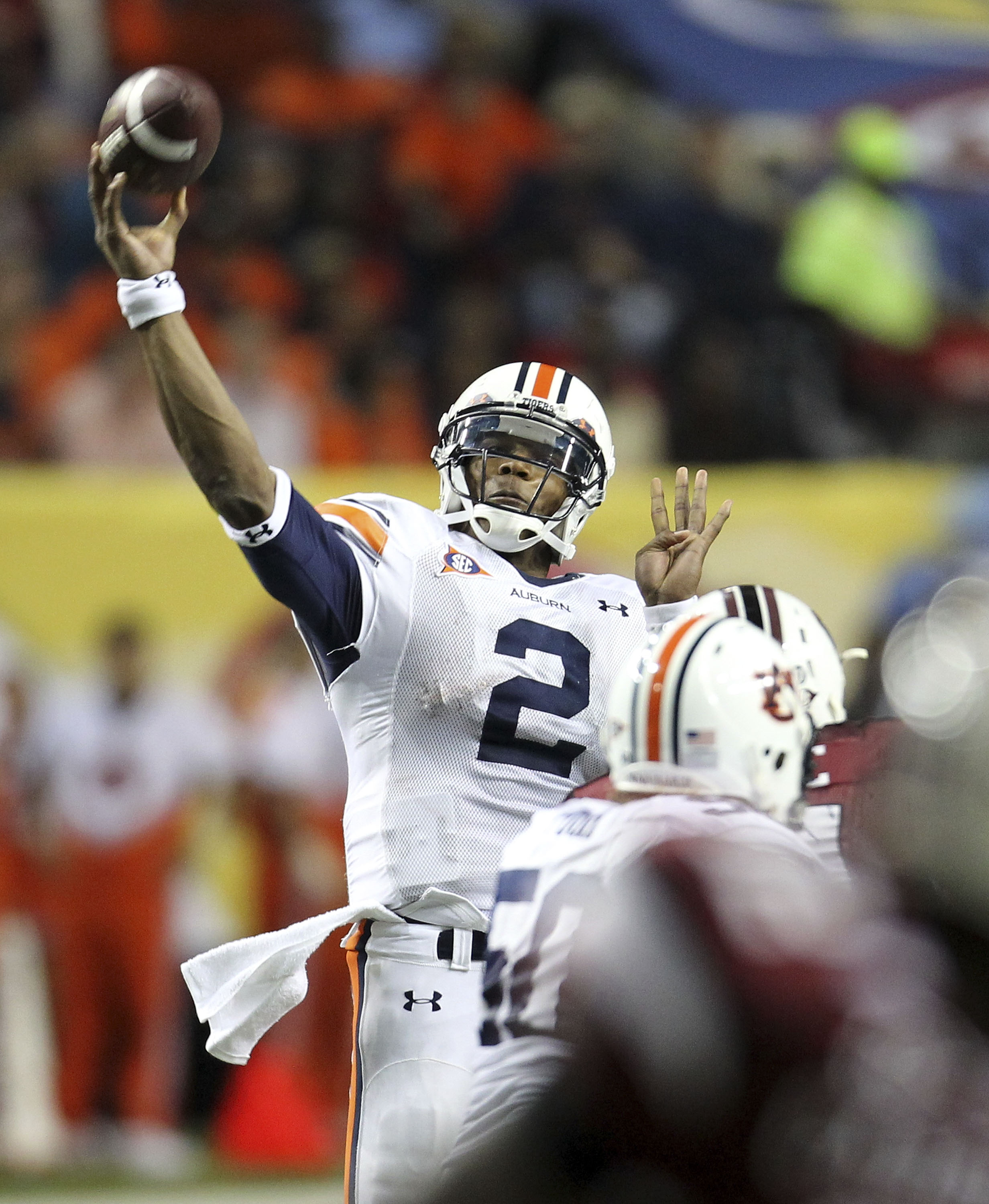 ATLANTA - DECEMBER 04:  Quarterback Cam Newton #2 of the Auburn Tigers passes the ball during the 2010 SEC Championship against the South Carolina Gamecocks at Georgia Dome on December 4, 2010 in Atlanta, Georgia.  (Photo by Mike Zarrilli/Getty Images)