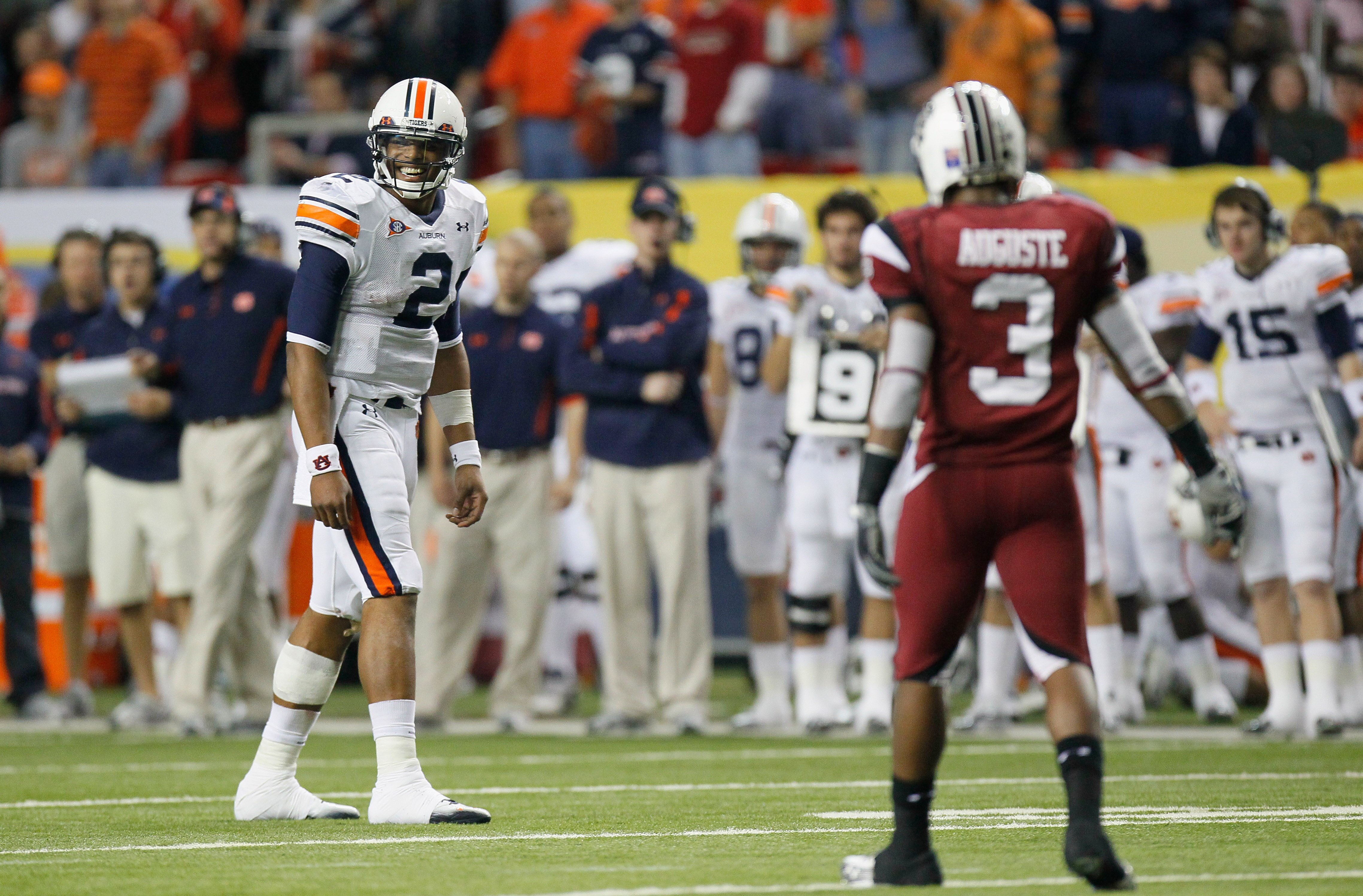 ATLANTA, GA - DECEMBER 04:  Quarterback Cam Newton #2 of the Auburn Tigers lines up as wide receiver against Akeem Auguste #3 of the South Carolina Gamecocks during the 2010 SEC Championship at Georgia Dome on December 4, 2010 in Atlanta, Georgia.  (Photo