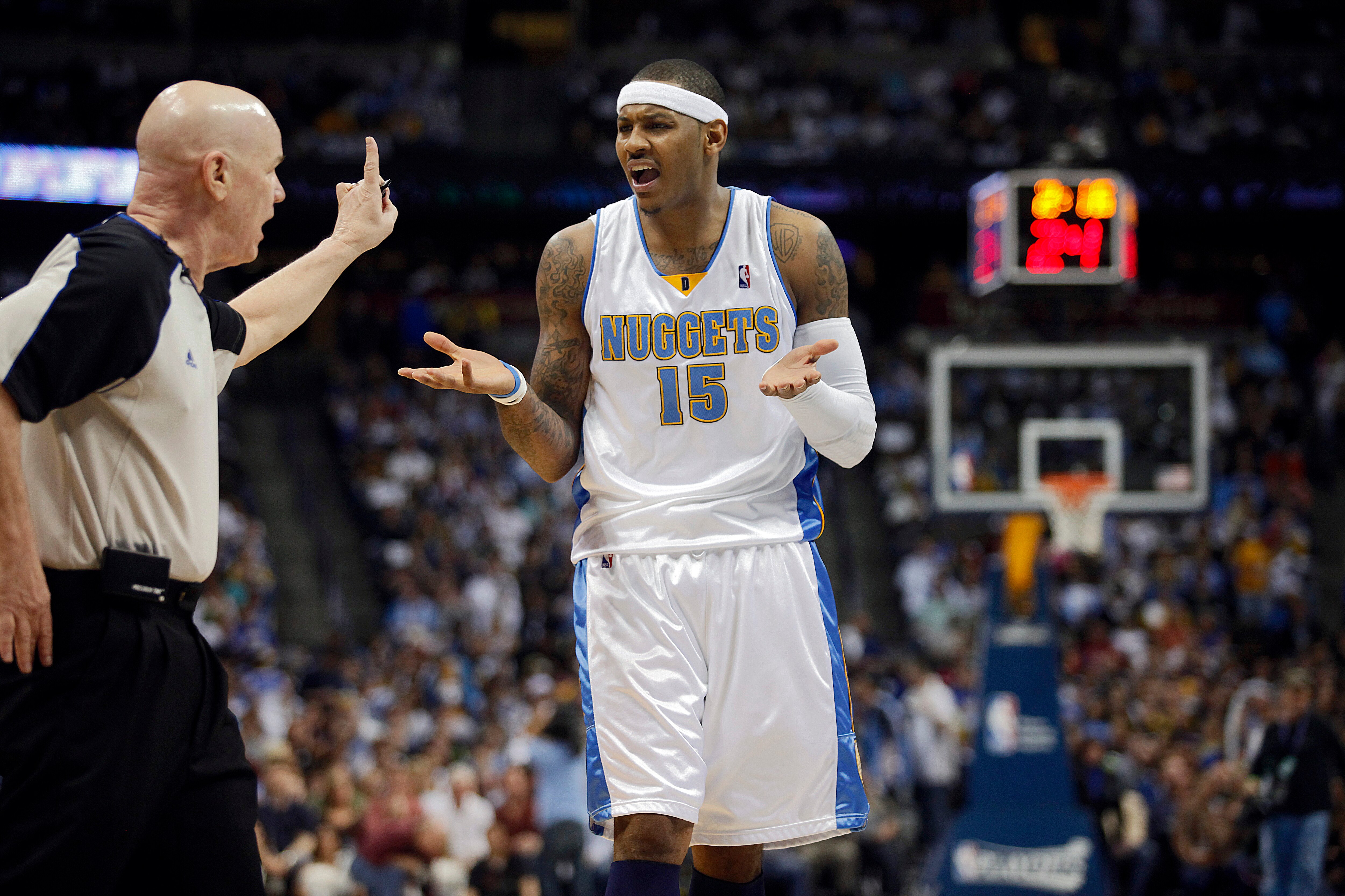 DENVER, CO - APRIL 17 : Carmelo Anthony #15 of the Denver Nuggets argues a call and gets hit with a technical foul by referee Joey Crawford during the first half of Game One of the Western Conference Quarterfinals against the Utah Jazz in the 2010 NBA Pla