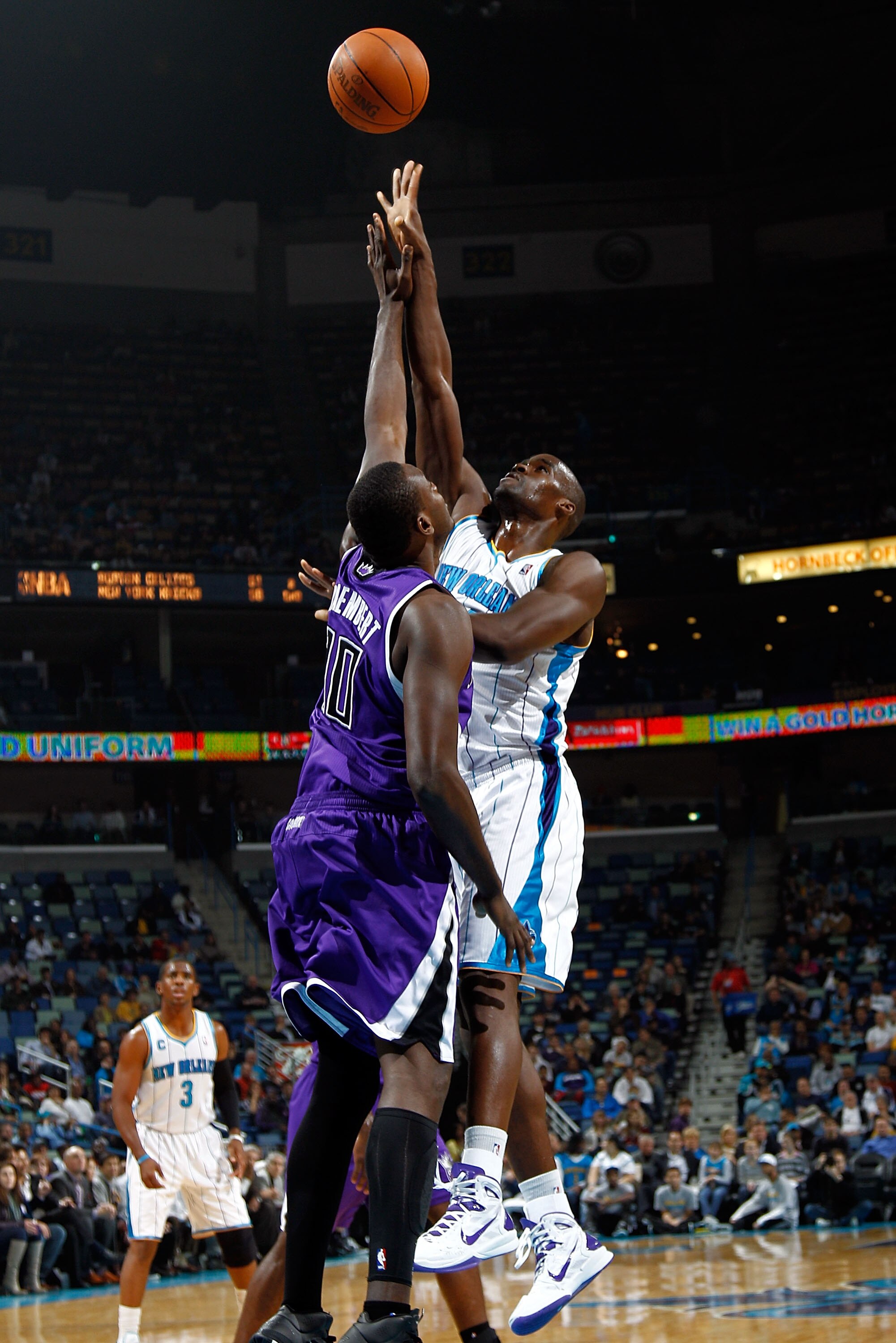 NEW ORLEANS, LA - DECEMBER 15:  Emeka Okafor #50 of the New Orleans Hornets shoots the ball over Samuel Dalembert #10 of the Sacramento Kings at the New Orleans Arena on December 15, 2010 in New Orleans, Louisiana.  NOTE TO USER: User expressly acknowledg