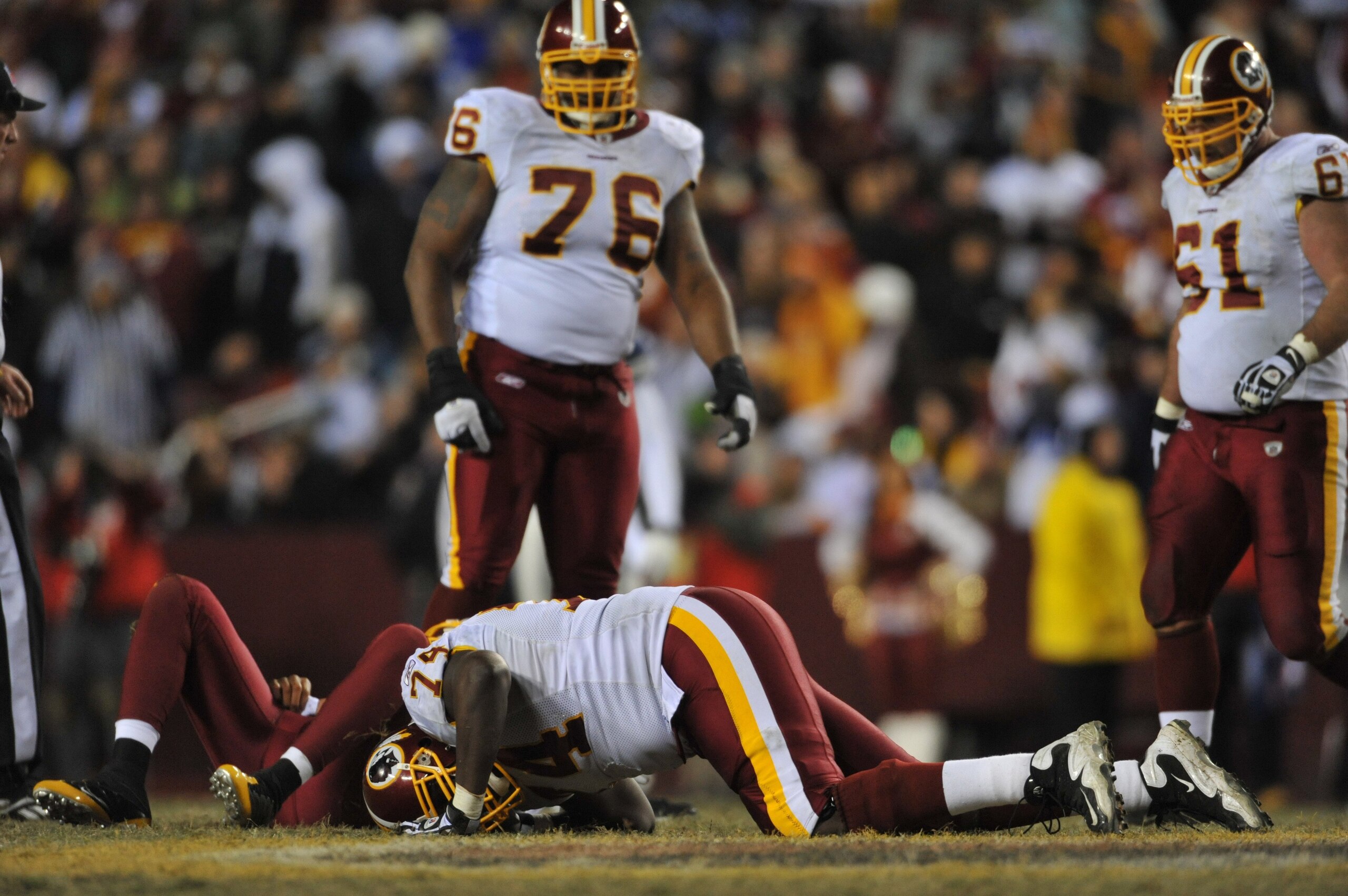 LANDOVER, MD - DECEMBER 27:  Stephon Heyer #74 of the Washington Redskins lies injured during the game against the Dallas Cowboys at FedExField on December 27, 2009 in Landover, Maryland. The Cowboys defeated the Redskins 17-0. (Photo by Larry French/Gett