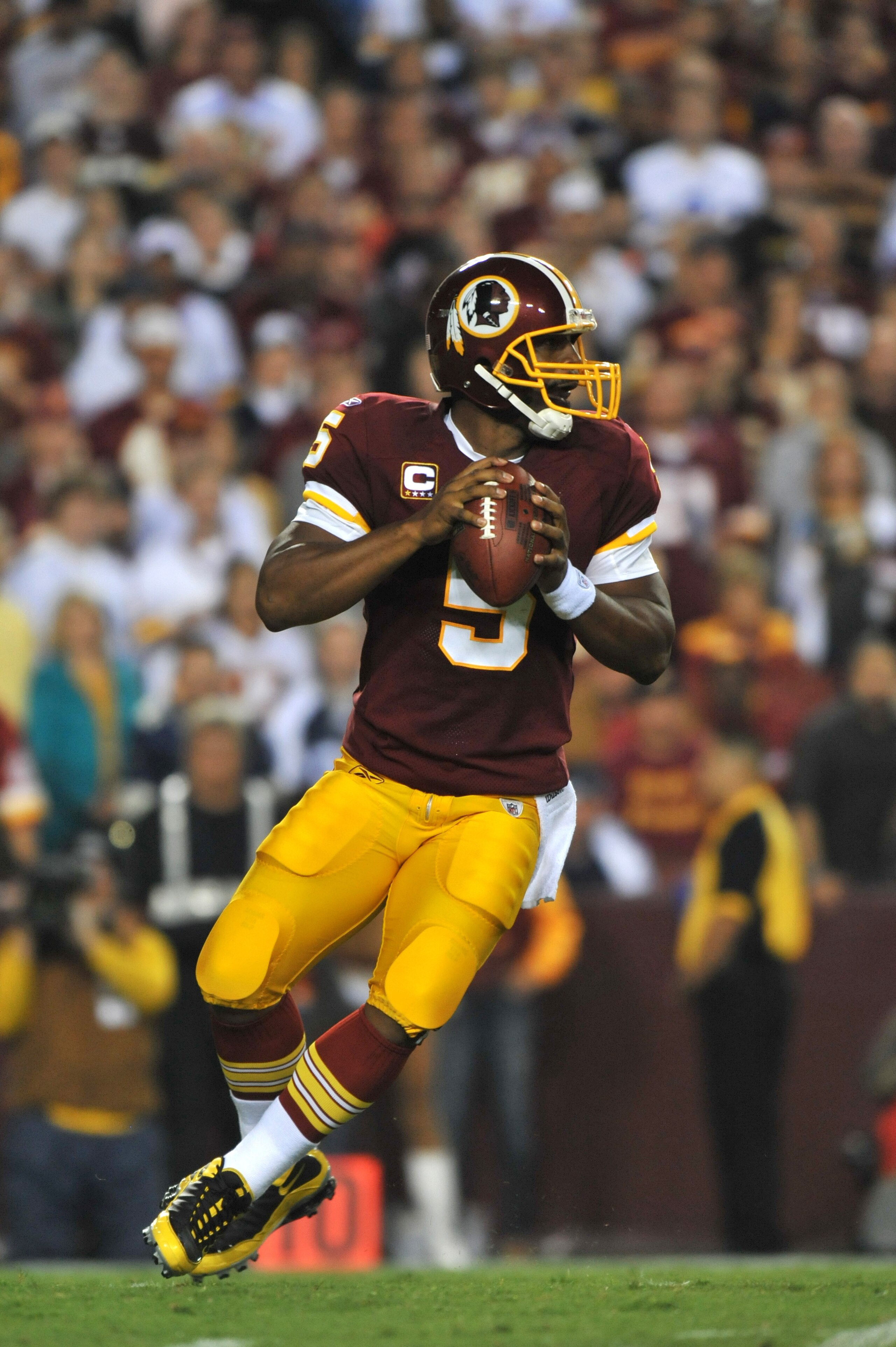 LANDOVER - SEPTEMBER 12:  Donovan McNabb #5 of the Washington Redskins passes during the NFL season opener against the Dallas Cowboys at FedExField on September 12, 2010 in Landover, Maryland. The Redskins defeated the Cowboys 13-7. (Photo by Larry French
