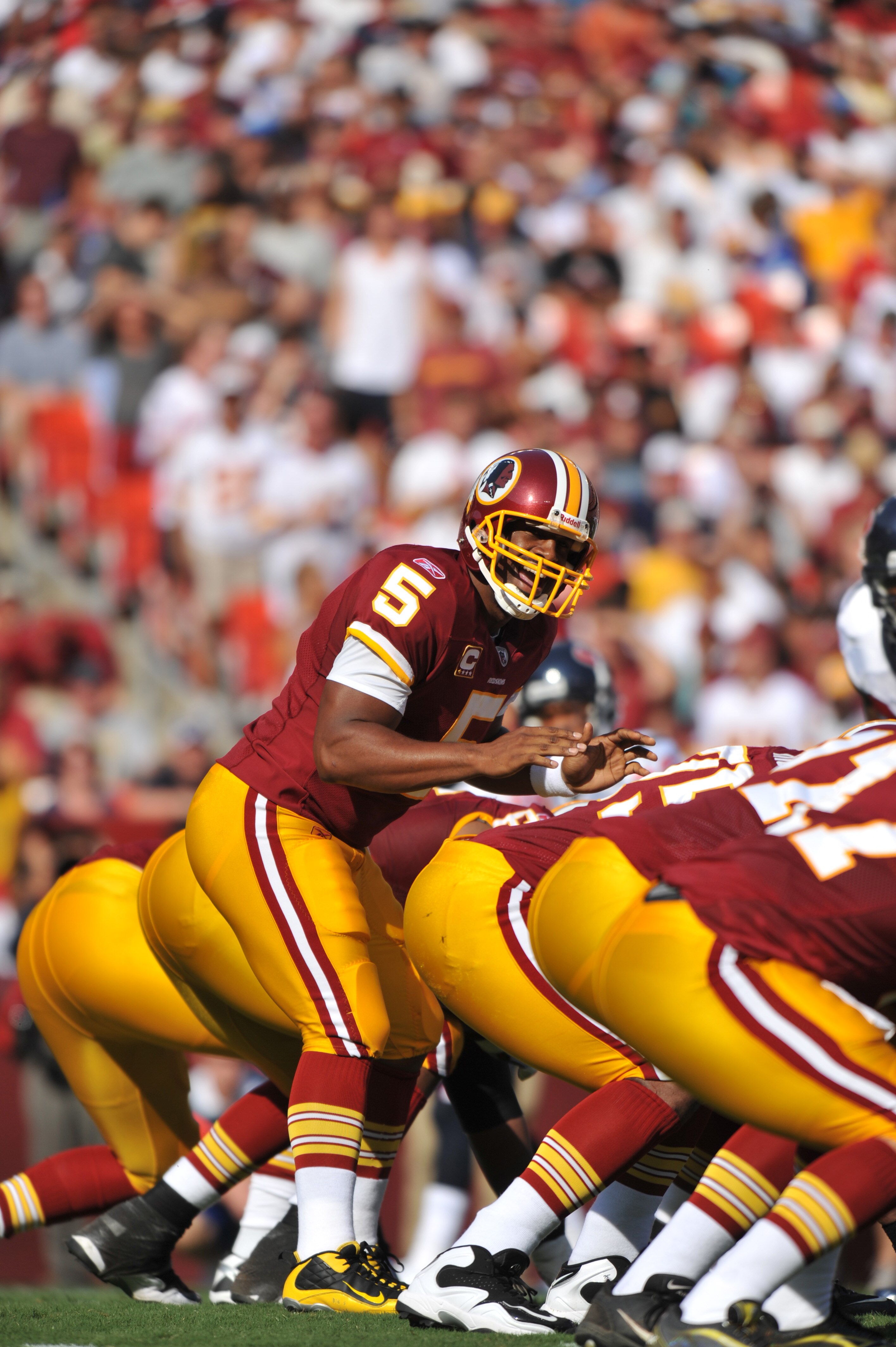 LANDOVER - SEPTEMBER 19:  Donovan McNabb #5 of the Washington Redskins audibles during the game against the Houston Texans at FedExField on September 19, 2010 in Landover, Maryland. The Texans defeated the Redskins in overtime 30-27. (Photo by Larry Frenc