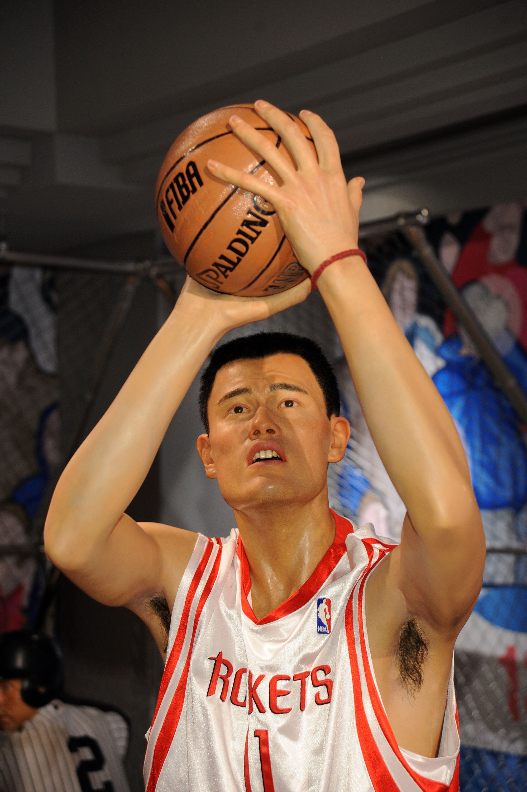 NEW YORK - MARCH 18:  The wax figure of basketball star Yao Ming appears on display during its unveiling at Madame Tussauds on March 18, 2009 in New York City.  (Photo by Bryan Bedder/Getty Images)