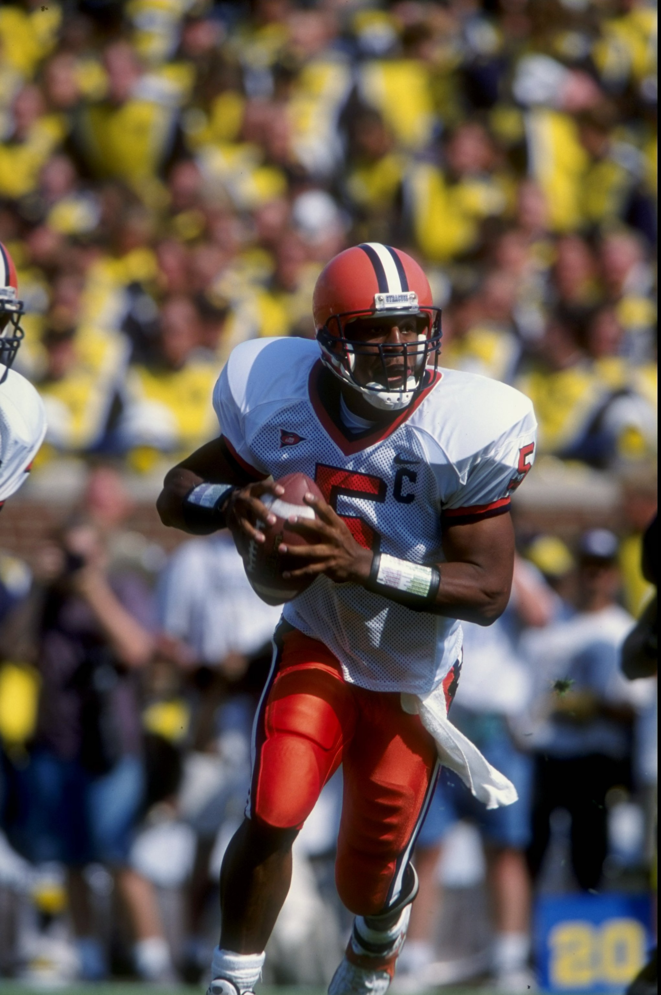 12 Sep 1998:  Quarterback Donovan McNabb #5 of the Syracuse Orangemen in action during a game against the Michigan Wolverines at the Michigan Stadium in Ann Arbor, Michigan. The Orangemen defeated the Wolverines 38-28. Mandatory Credit: Vincent Laforet  /