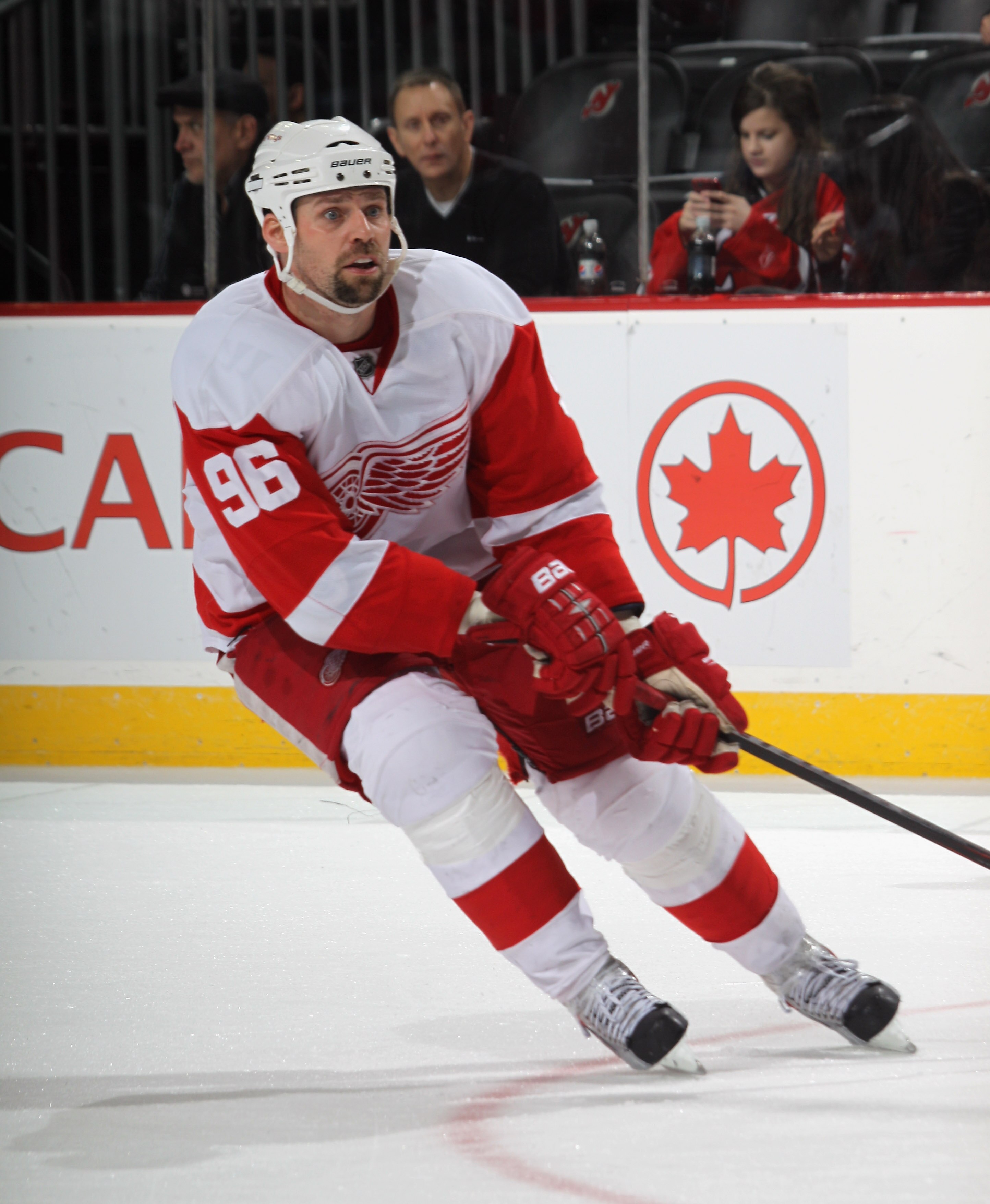 NEWARK, NJ - DECEMBER 11:  Tomas Holmstrom #96 of the Detroit Red Wings skates against the New Jersey Devils at the Prudential Center on December 11, 2010 in Newark, New Jersey. The Red Wings defeated the the Devils 4-1.  (Photo by Bruce Bennett/Getty Ima