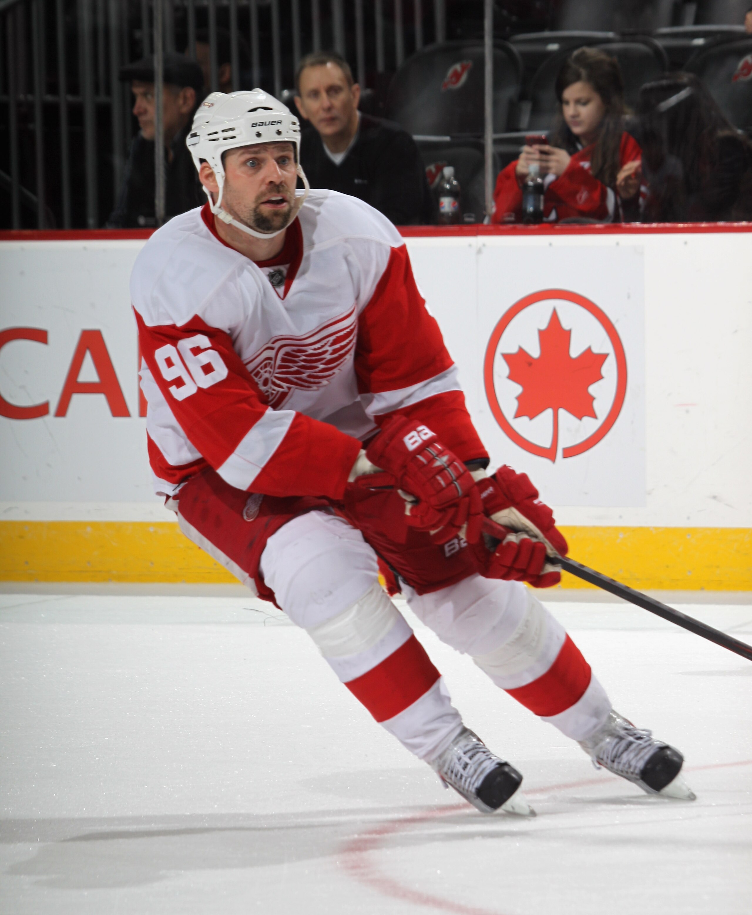 NEWARK, NJ - DECEMBER 11:  Tomas Holmstrom #96 of the Detroit Red Wings skates against the New Jersey Devils at the Prudential Center on December 11, 2010 in Newark, New Jersey. The Red Wings defeated the the Devils 4-1.  (Photo by Bruce Bennett/Getty Ima