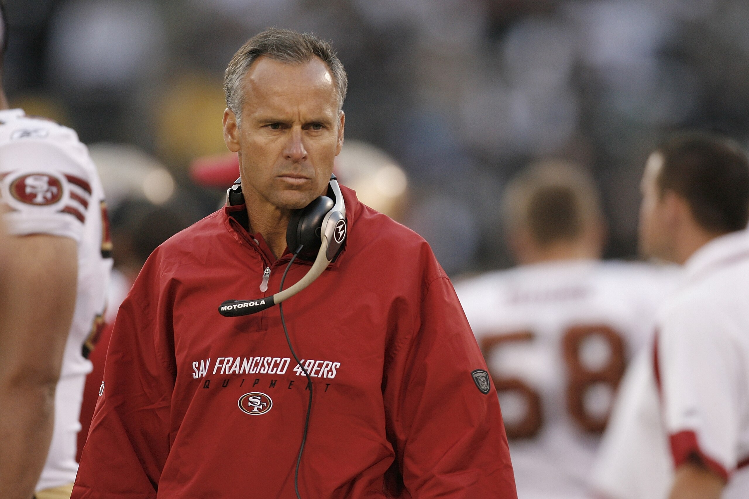 OAKLAND, CA - AUGUST 08:  Head coach Mike Nolan of the San Francisco 49ers scowls on the sidelines during a preseason game against the Oakland Raiders on August 8, 2008, at the McAfee Coliseum in Oakland, California.  (Photo by Greg Trott/Getty Images)