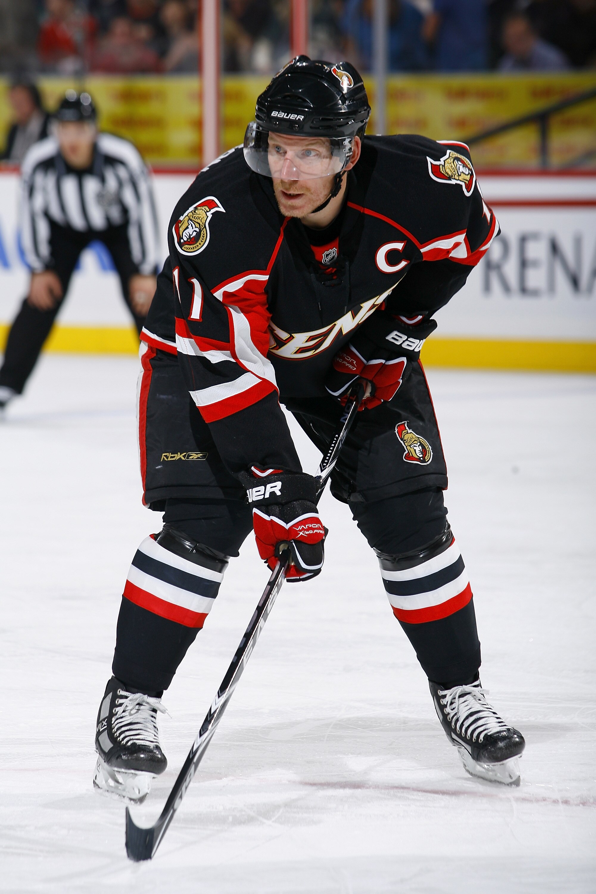 OTTAWA, ON - NOVEMBER 24: Daniel Alfredsson #11 of the Ottawa Senators waits for a faceoff in a game against the Dallas Stars at Scotiabank Place on November 24, 2010 in Ottawa, Ontario, Canada. (Photo by Phillip MacCallum/Getty Images)