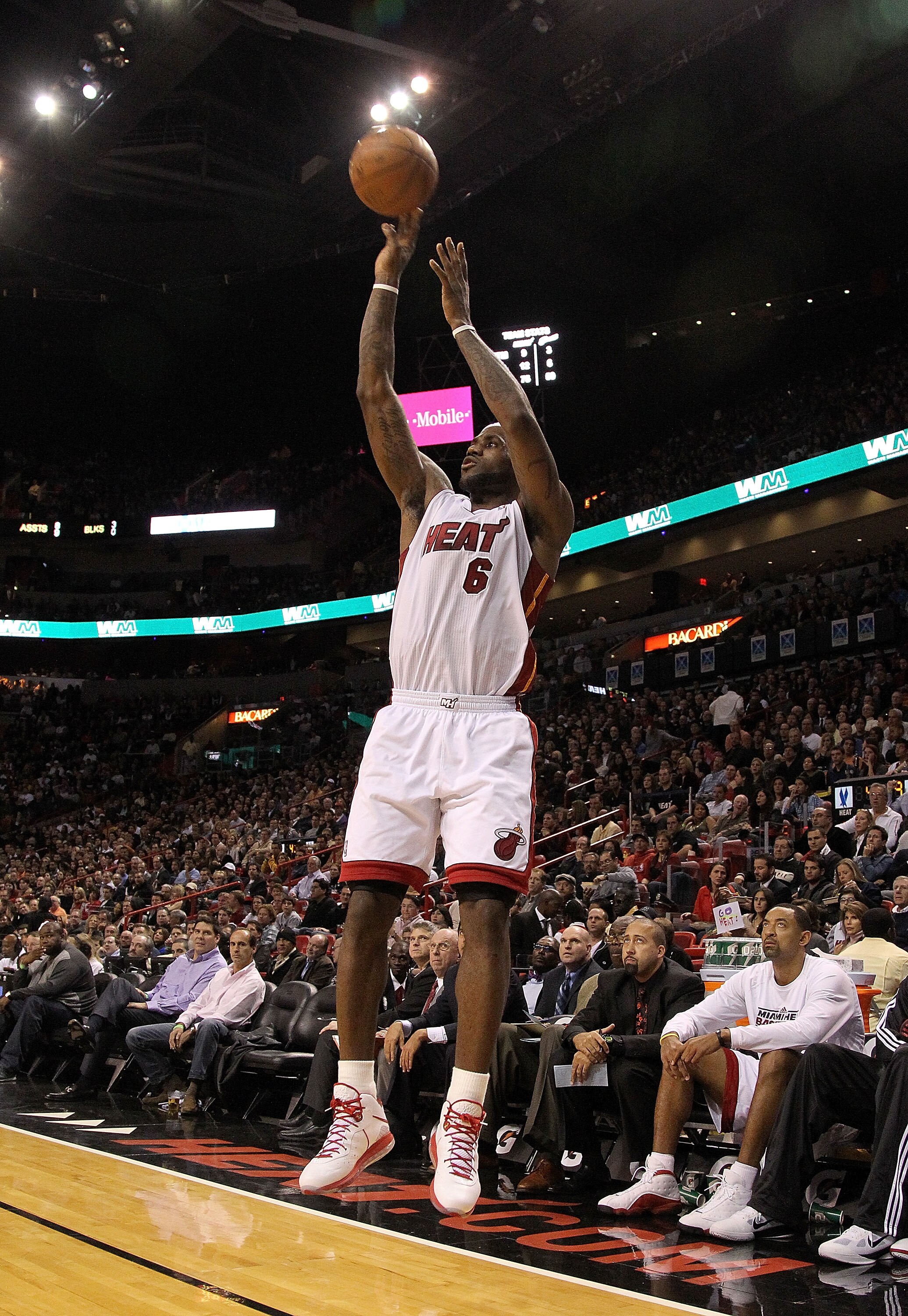 MIAMI, FL - DECEMBER 15: LeBron James #6 of the Miami Heat shoots a jump shot during a game against the Cleveland Cavaliers at American Airlines Arena on December 15, 2010 in Miami, Florida. NOTE TO USER: User expressly acknowledges and agrees that, by do