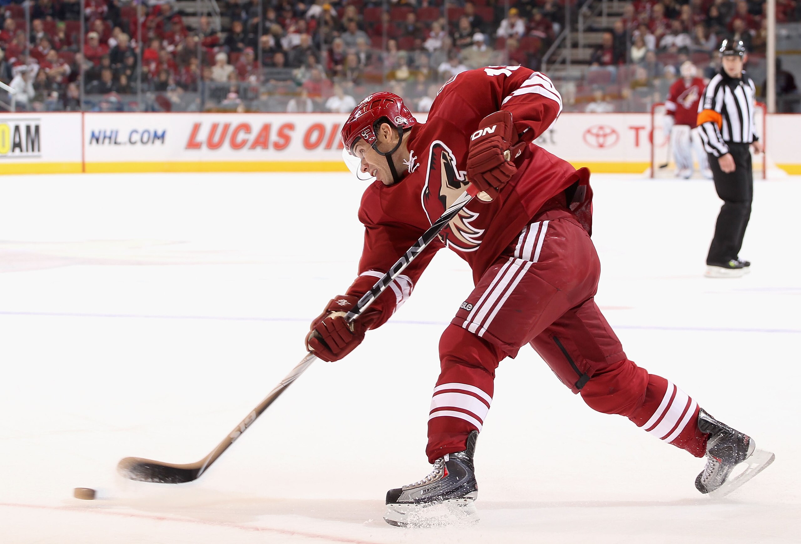 GLENDALE, AZ - DECEMBER 04:  Ray Whitney #13 of the Phoenix Coyotes shoots the puck against the Florida Panthers during the NHL game at Jobing.com Arena on December 4, 2010 in Glendale, Arizona.  (Photo by Christian Petersen/Getty Images)