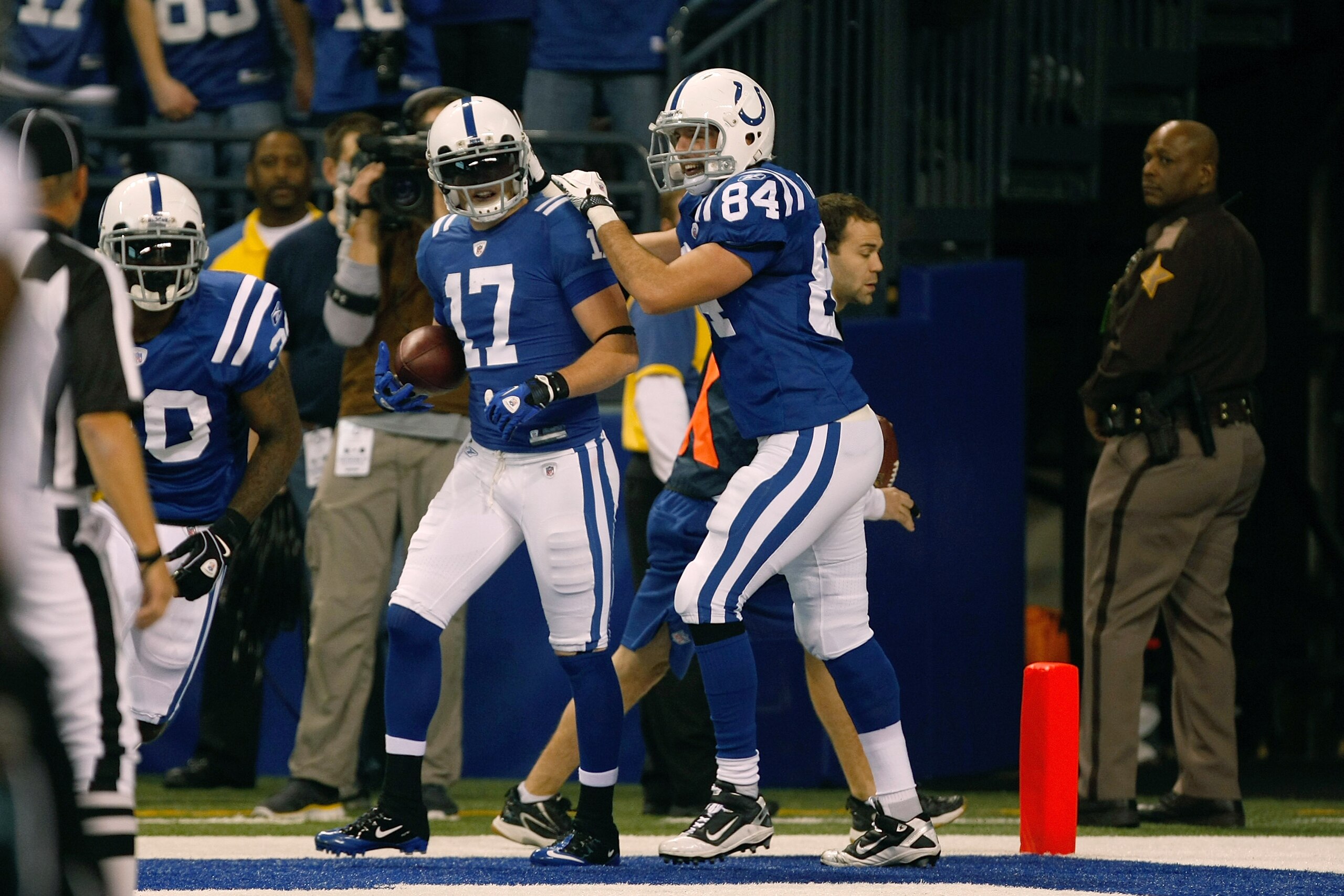 INDIANAPOLIS, IN - DECEMBER 19: Austin Collie #17 of the Indianapolis Colts scores his second touchdown of the game as he celebrates with Jacob Tamme #84 against the Jacksonville Jaguars at Lucas Oil Stadium on December 19, 2010 in Indianapolis, Indiana.