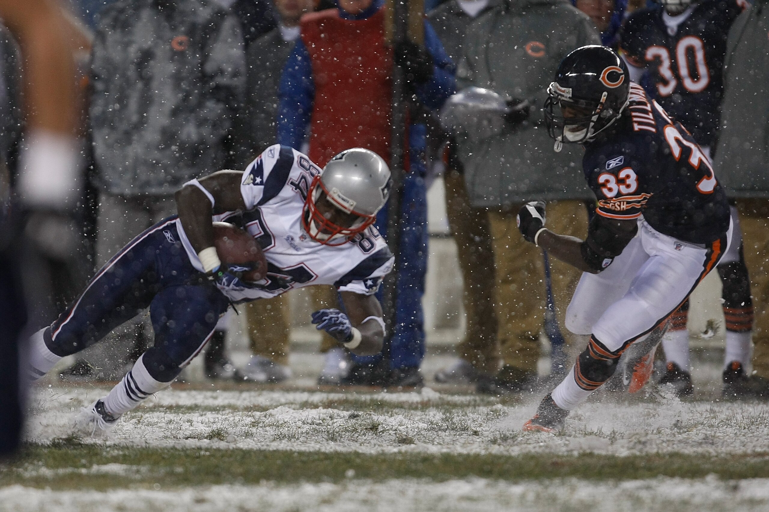 CHICAGO, IL - DECEMBER 12: Deion Branch #84 of the New England Patriots runs against the Chicago Bears at Soldier Field on December 12, 2010 in Chicago, Illinois. The Patriots defeated the Bears 36-7. (Photo by Scott Boehm/Getty Images)