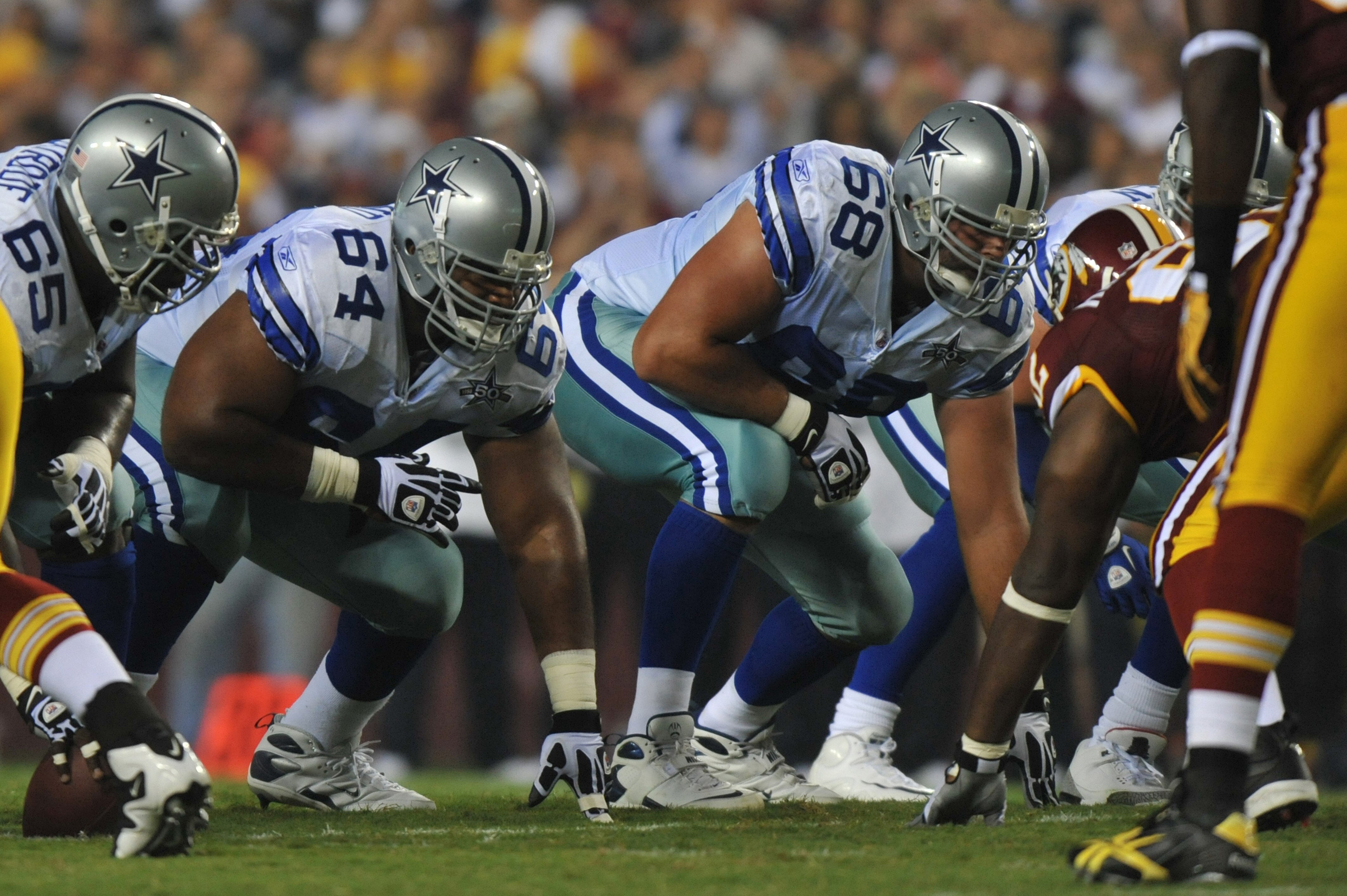 LANDOVER - SEPTEMBER 12:  Doug Free #68 of the Dallas Cowboys defends during the NFL season opener against the Washington Redskins at FedExField on September 12, 2010 in Landover, Maryland. The Redskins defeated the Cowboys 13-7. (Photo by Larry French/Ge