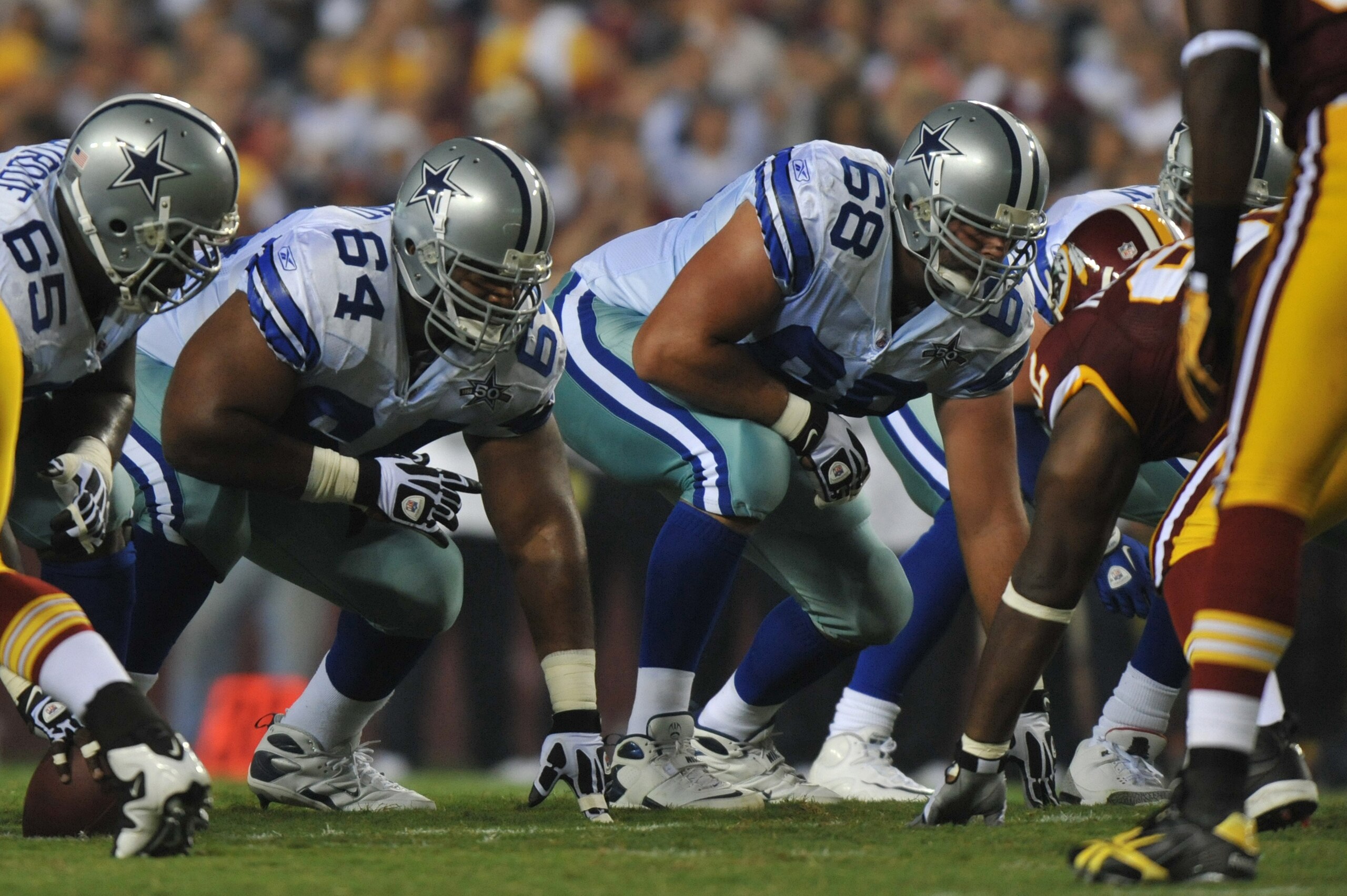 LANDOVER - SEPTEMBER 12:  Doug Free #68 of the Dallas Cowboys defends during the NFL season opener against the Washington Redskins at FedExField on September 12, 2010 in Landover, Maryland. The Redskins defeated the Cowboys 13-7. (Photo by Larry French/Ge