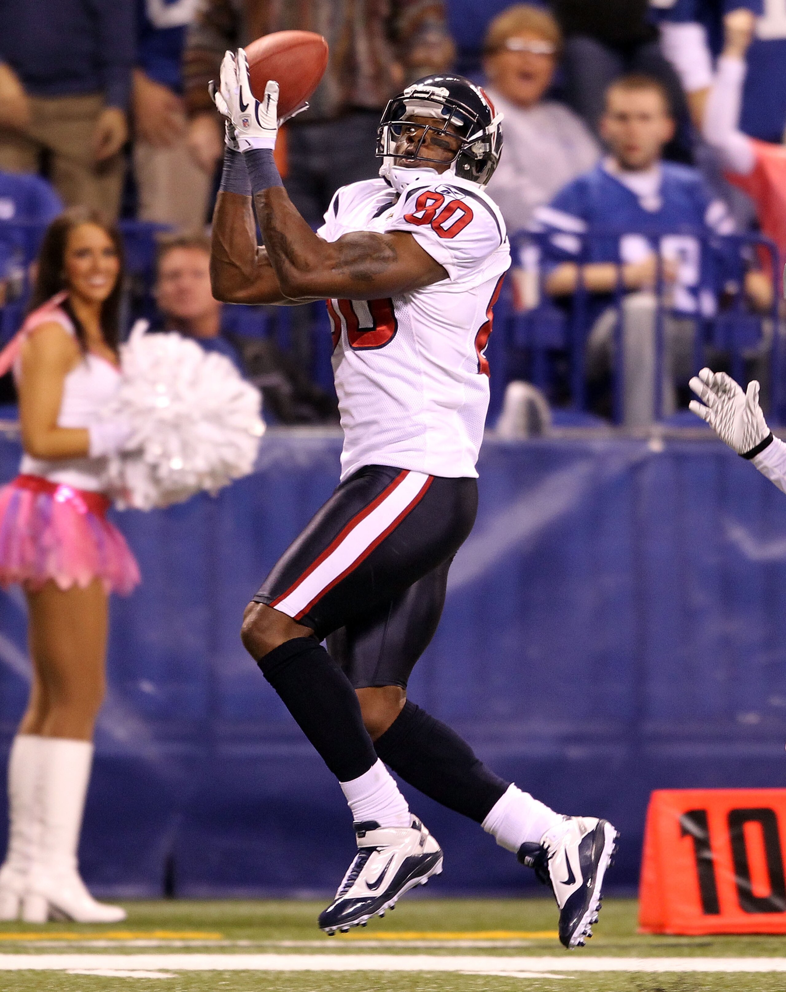 INDIANAPOLIS - NOVEMBER 01:  Andre Johnson #80 of Houston Texans catches a touchdown pass during the NFL game against the Indianapolis Colts at Lucas Oil Stadium on November 1, 2010 in Indianapolis, Indiana.  (Photo by Andy Lyons/Getty Images)