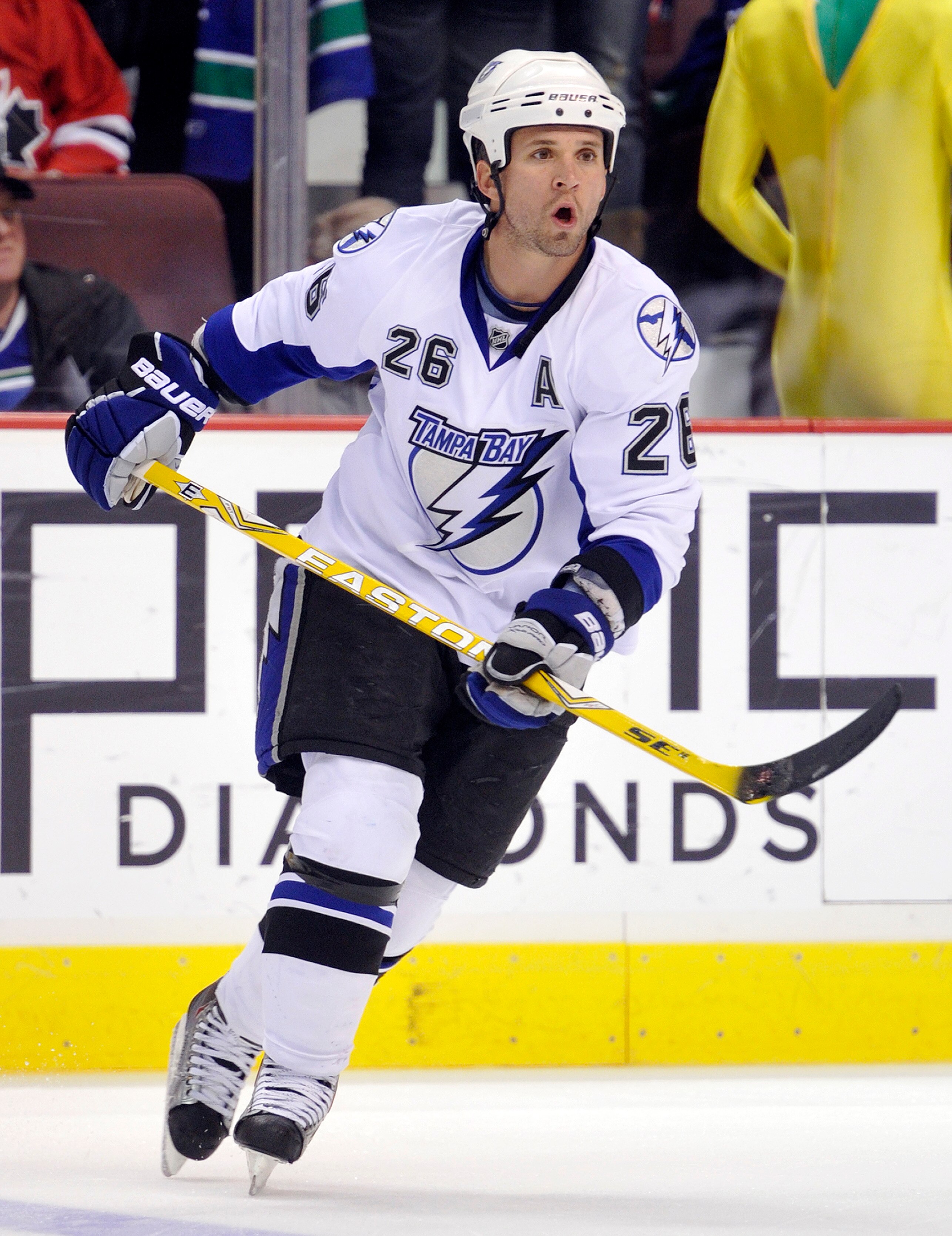 VANCOUVER, CANADA - DECEMBER 11: Martin St Louis #26 of the Tampa Bay Lightning skates during the pre-game warmup prior to NHL action on December 11, 2010 against the Vancouver Canucks at Rogers Arena in Vancouver, BC, Canada.  (Photo by Rich Lam/Getty Im