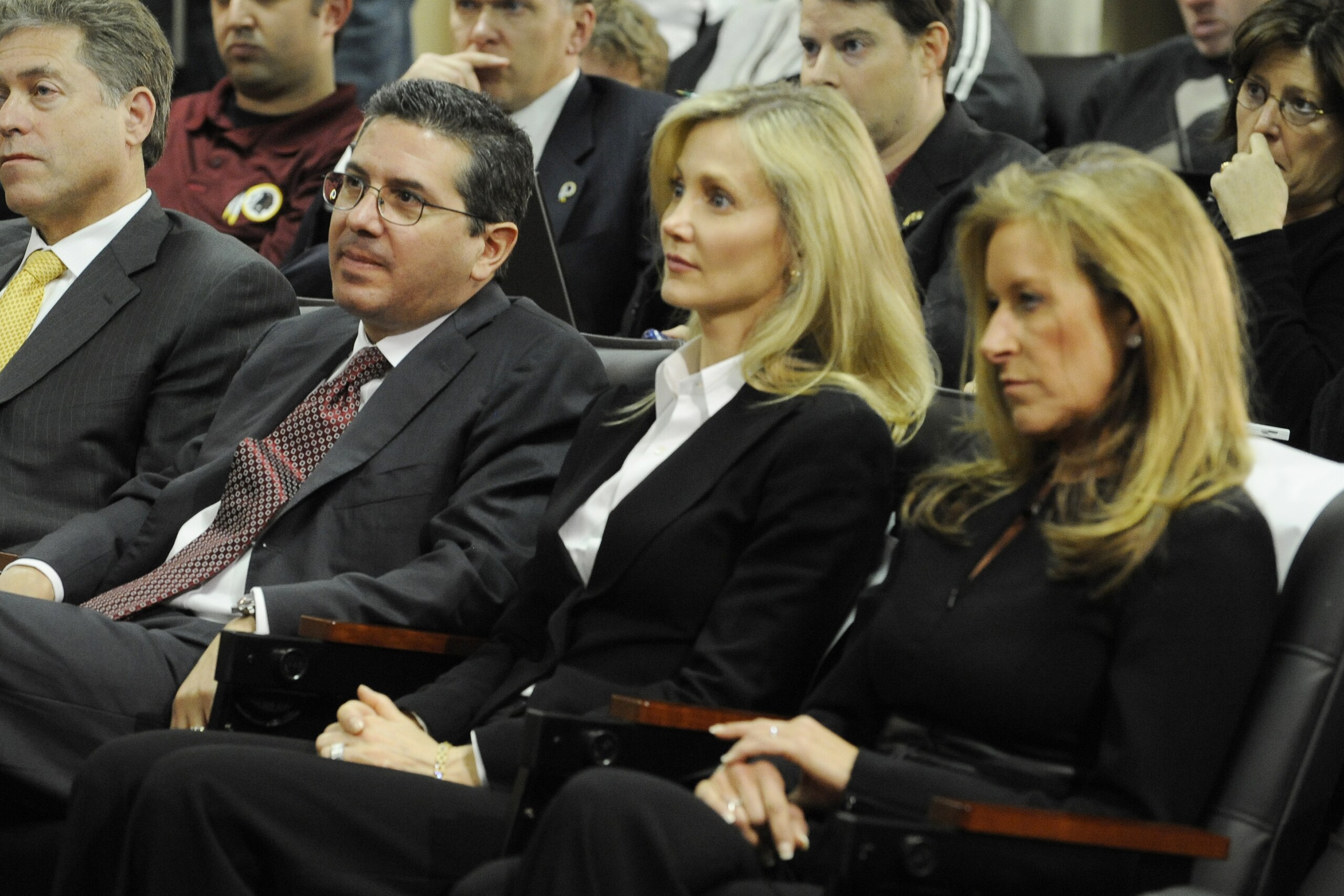 ASHBURN,VA - JANUARY 6: Dan Snyder (L), owner of the Washington Redskins with wife Tanya (C) and Peggy Shanahan (R) look on as Mike Shanahan is introduced to the media on January 6, 2010 at Redskins Park in Ashburn, Virginia. (Photo by Mitchell Layton/G ASHBURN,VA - JANUARY 6: Dan Snyder (L), owner of the Washington Redskins with wife Tanya (C) and Peggy Shanahan (R) look on as Mike Shanahan is introduced to the media on January 6, 2010 at Redskins Park in Ashburn, Virginia. (Photo by Mitchell Layton/G