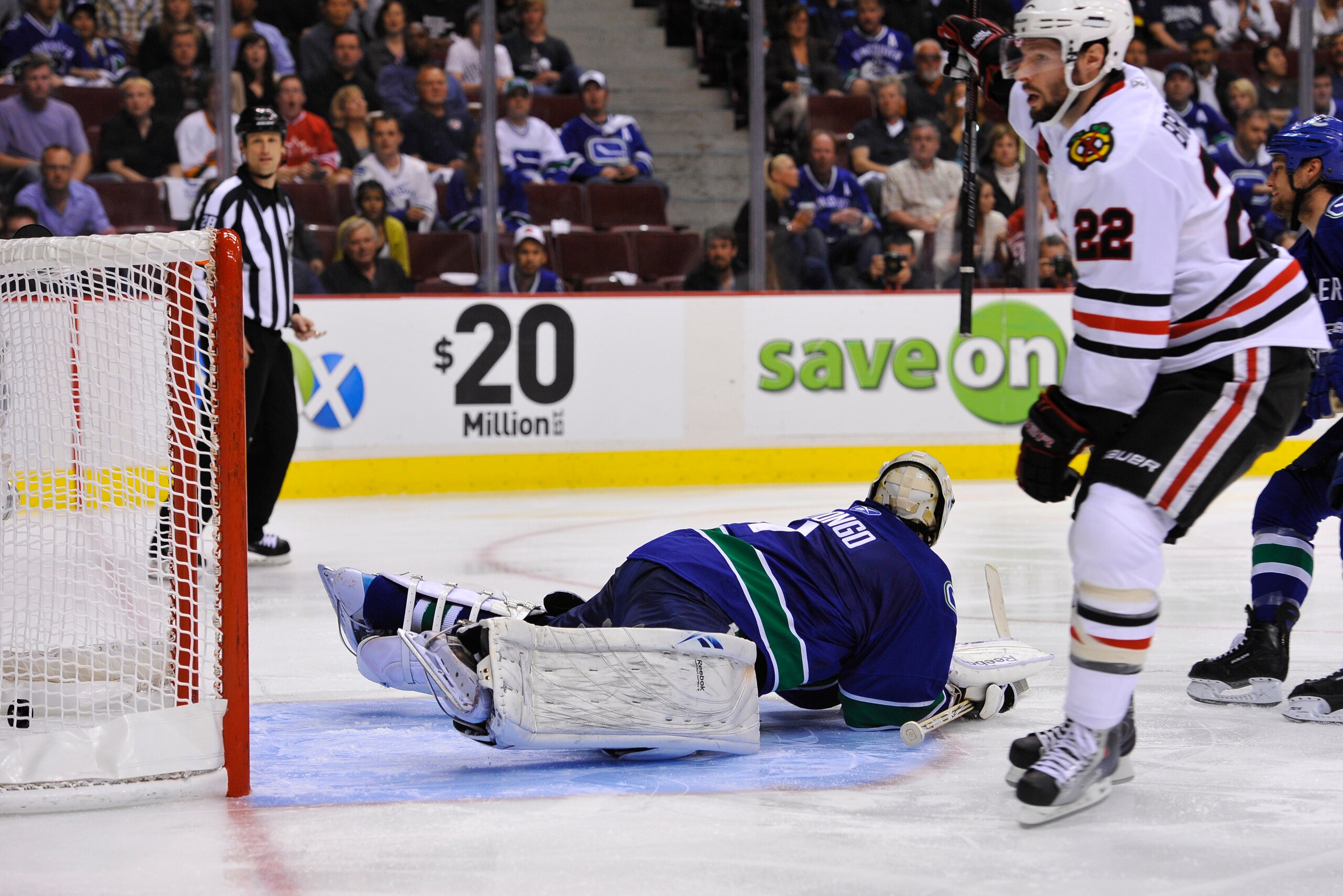 VANCOUVER, CANADA - MAY 11:  Goalie Roberto Luongo #1 of the Vancouver Canucks lies on the ice after Troy Brouwer #22 of the Chicago Blackhawks scores a goal during the second period in Game Six of the Western Conference Semifinals during the 2010 NHL Sta