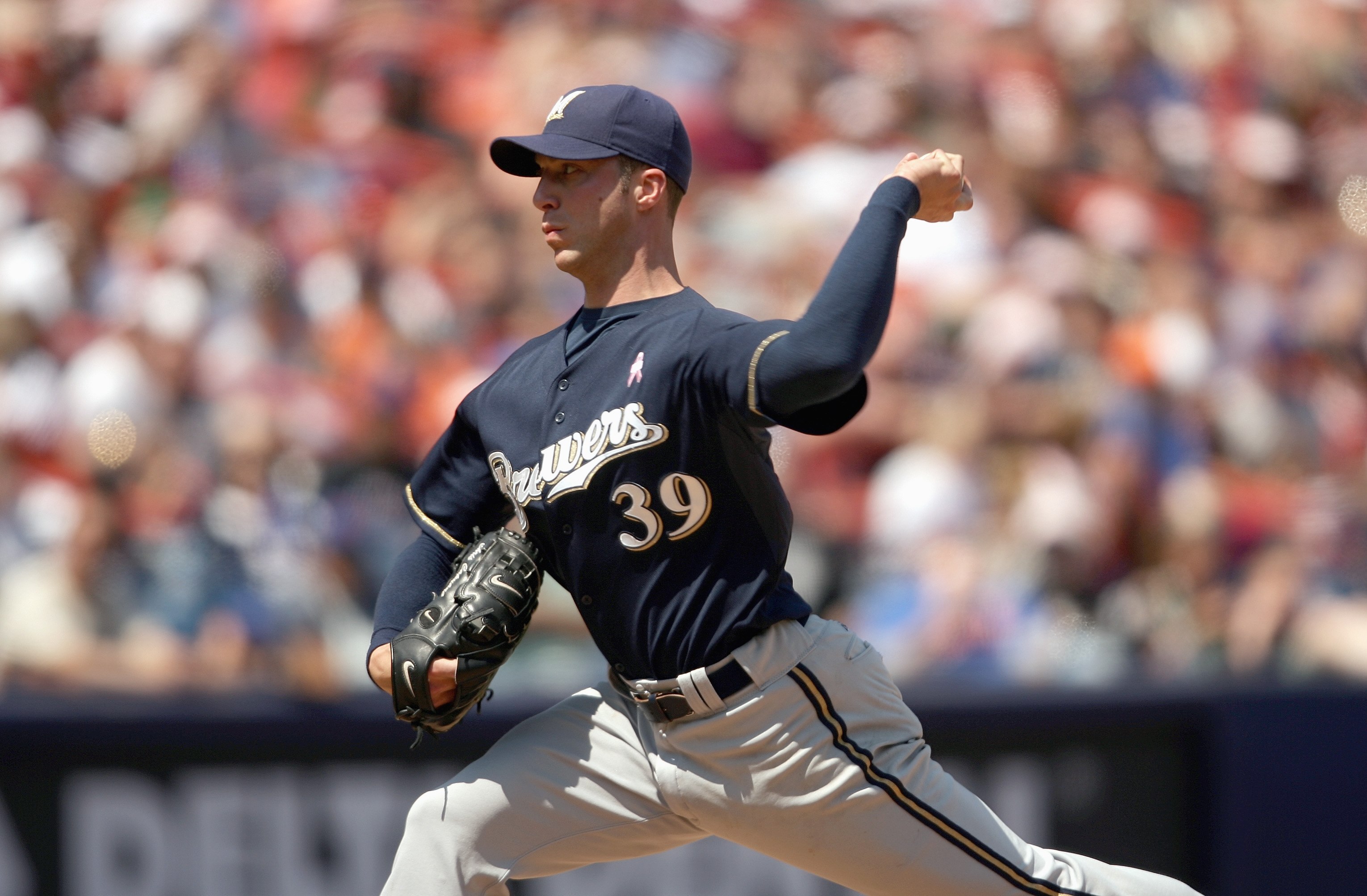 NEW YORK - MAY 13: Chris Capuano #39 of the Milwaukee Brewers delivers the pitch during the Mothers Day game against the New York Mets on May 13, 2007 at Shea Stadium in the Flushing neighborhood of the Queens borough of New York City. The Mets defeated t