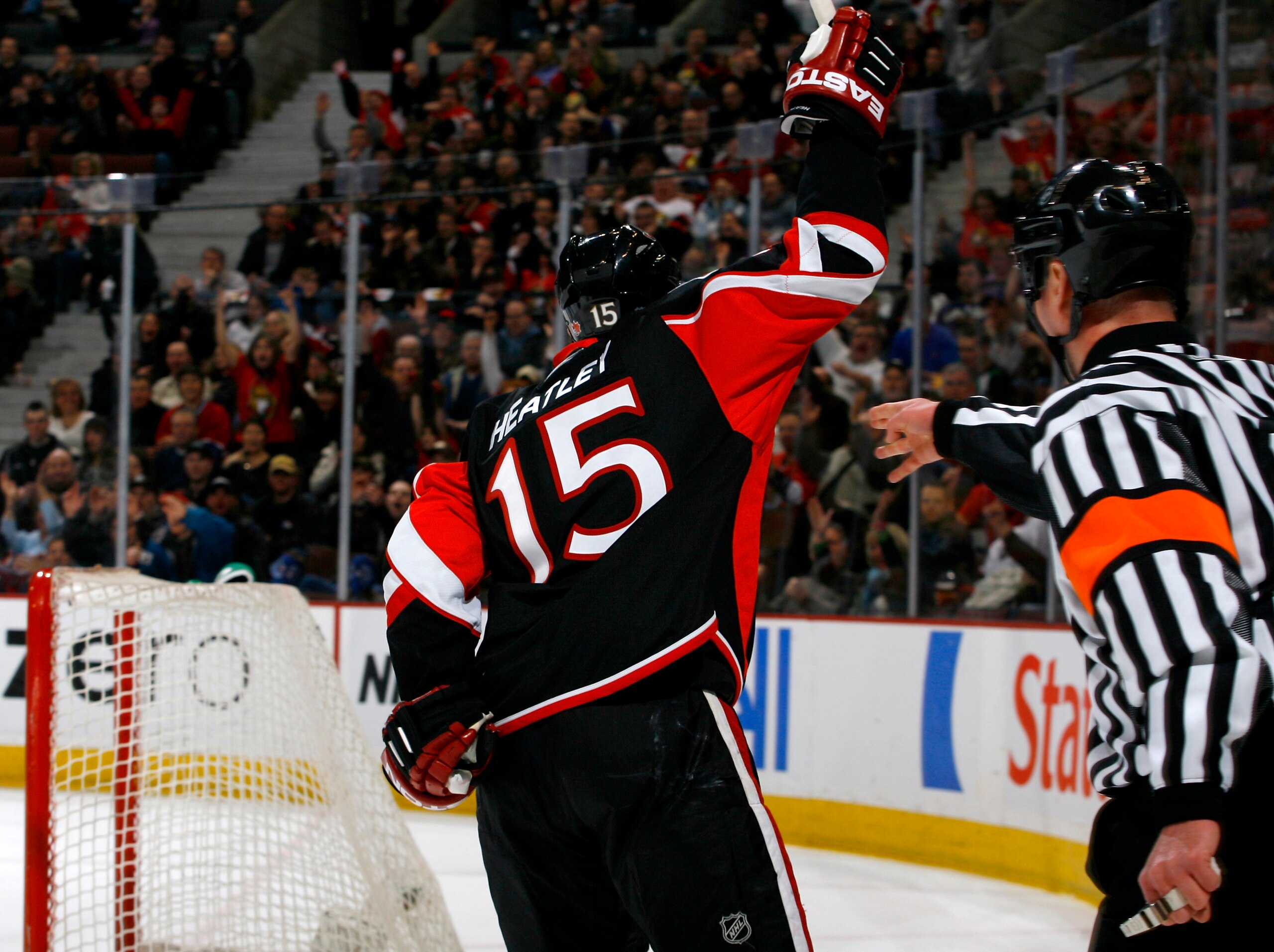 OTTAWA - FEBRUARY 19:  Dany Heatley #15 of the Ottawa Senators celebrates a goal against the Vancouver Canucks in a game on February 19, 2009 at the Scotiabank Place in Ottawa, Canada. (Photo by Phillip MacCallum/Getty Images)