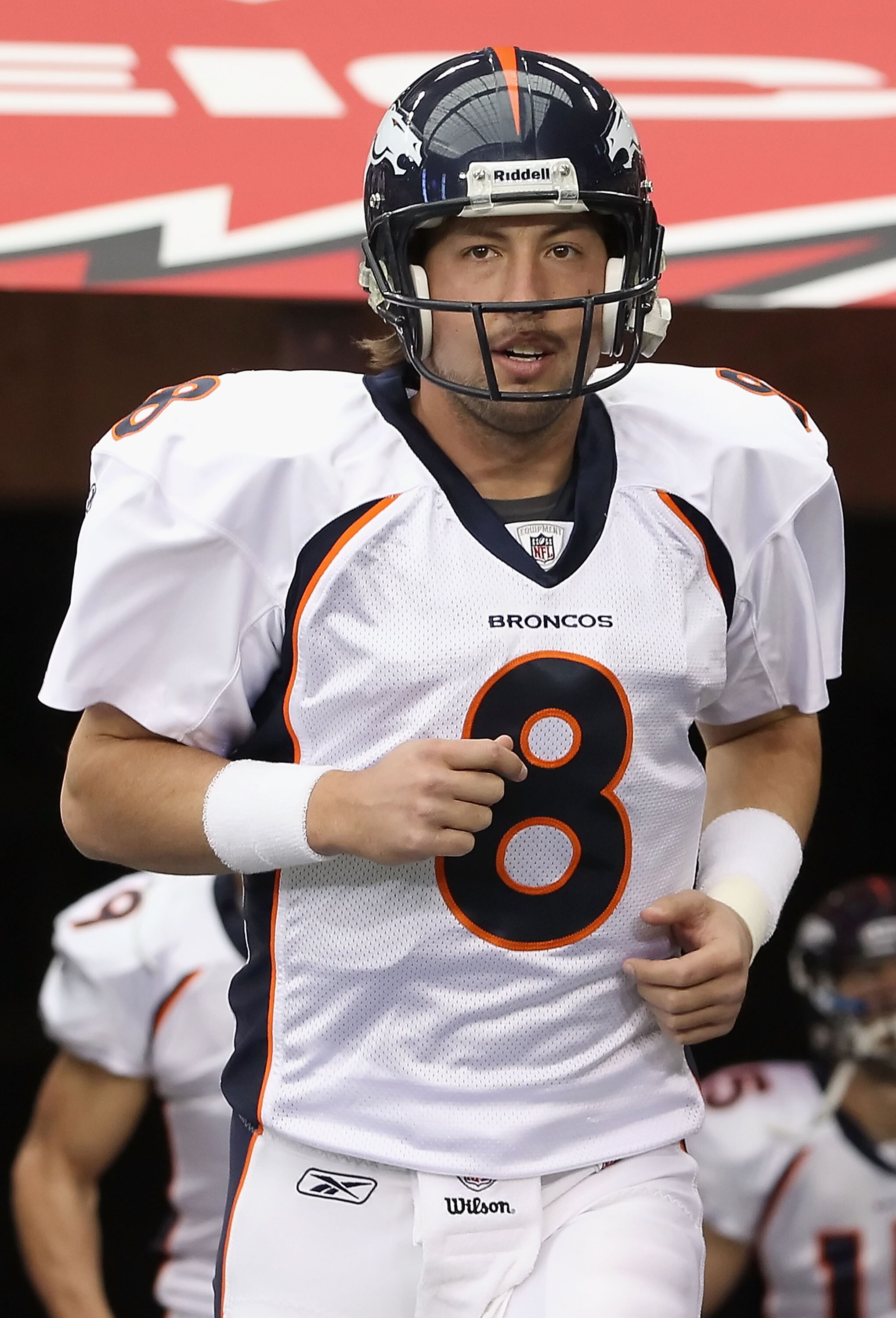 GLENDALE, AZ - DECEMBER 12:  Quarterback Kyle Orton #8 of the Denver Broncos runs out onto the field before the NFL game against the Arizona Cardinals at the University of Phoenix Stadium on December 12, 2010 in Glendale, Arizona.  The Cardinals defeated 