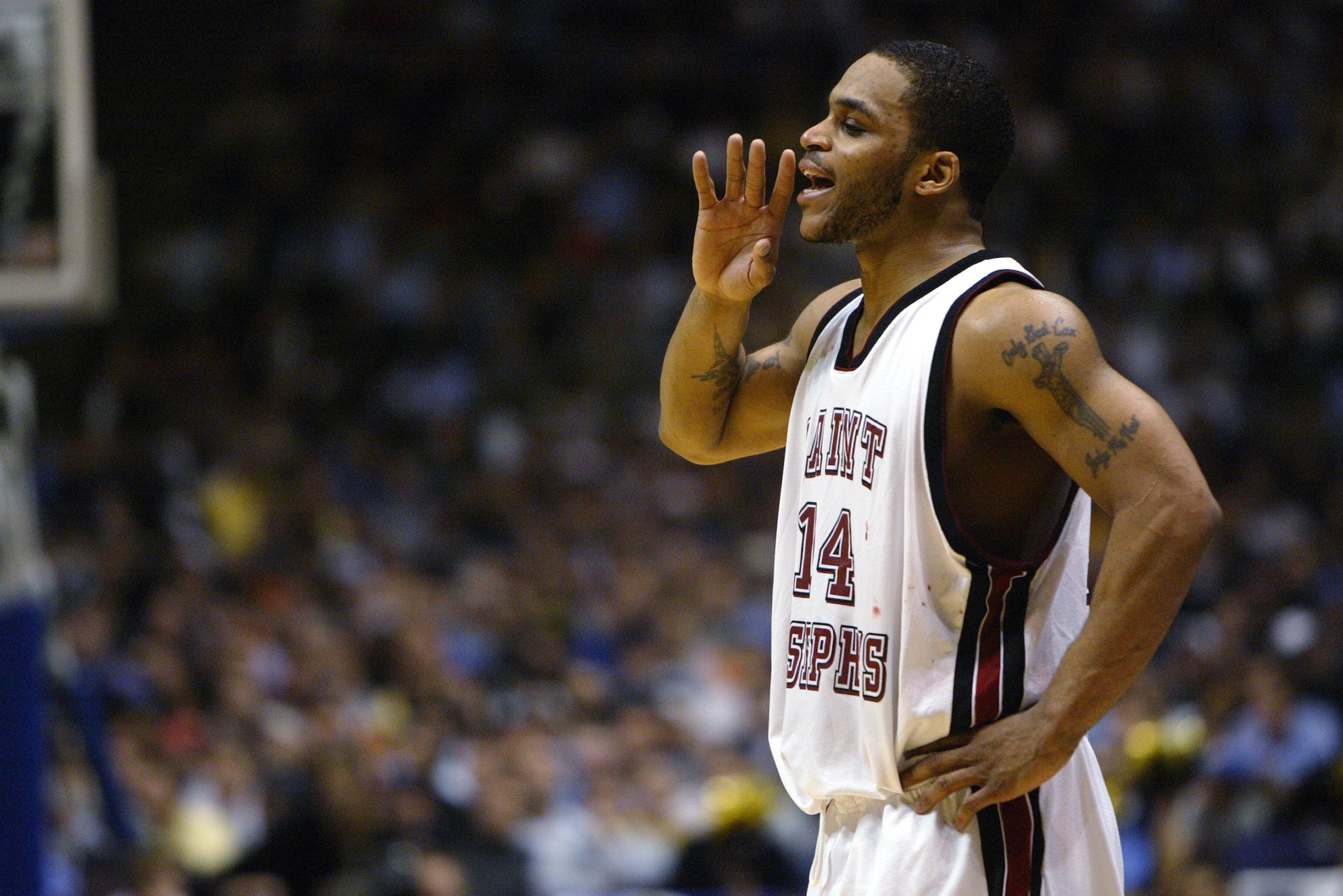 EAST RUTHERFORD, NJ - MARCH 25:  Jameer Nelson #14 of the St. Joseph's Hawks yells during the third round game of the NCAA Division I Men's Basketball Tournament against the Wake Forest Demon Deacons at Continental Airlines Arena on March 25, 2004 in East