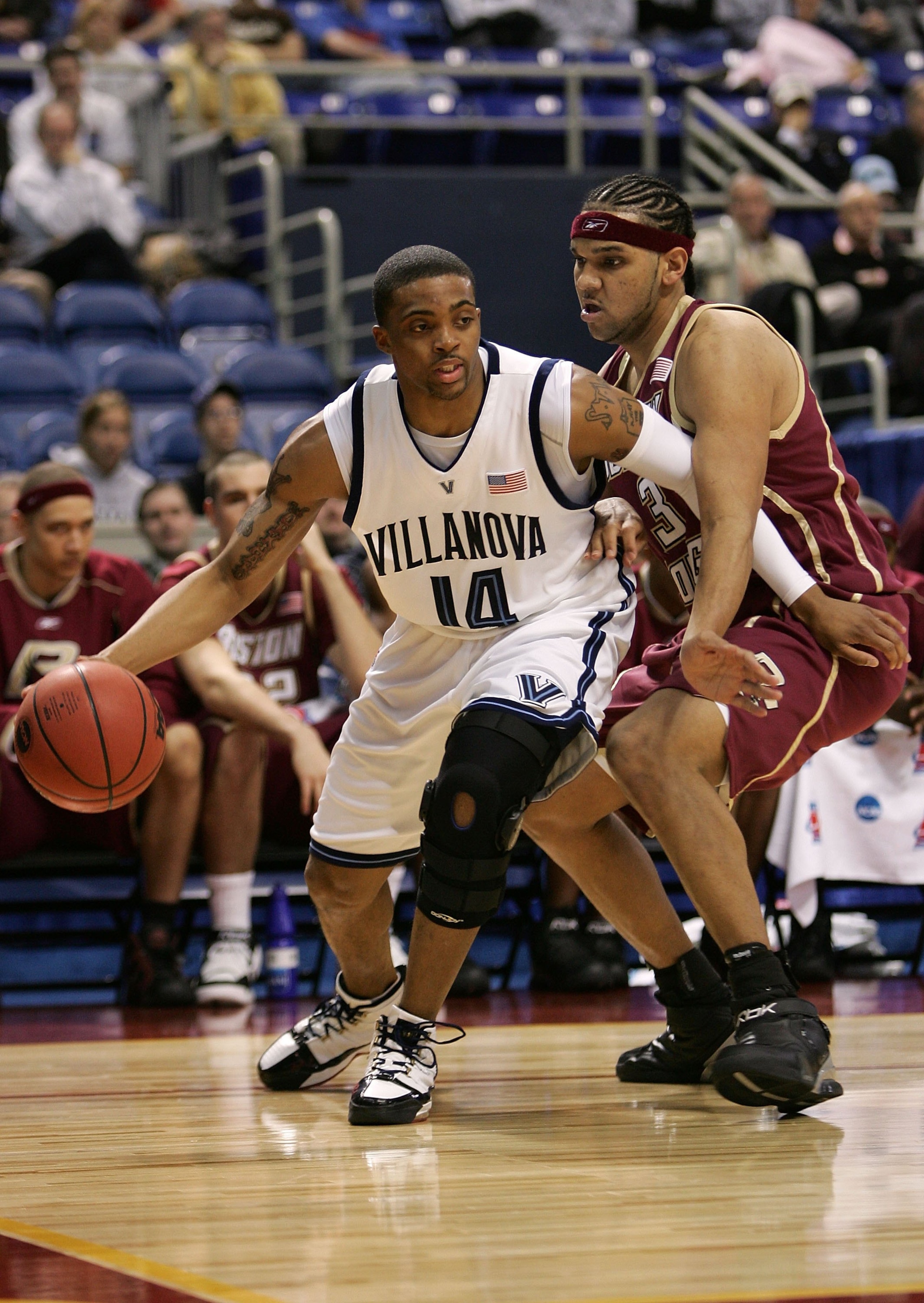 MINNEAPOLIS, MN - MARCH 24:  Allan Ray #14 of the Villanova Wildcats drives baseline in the first half against Jared Dudley #3 of the Boston College Eagles during their Minneapolis Regional Semifinal of the 2006 NCAA Divison I Men's Basketball Tournament