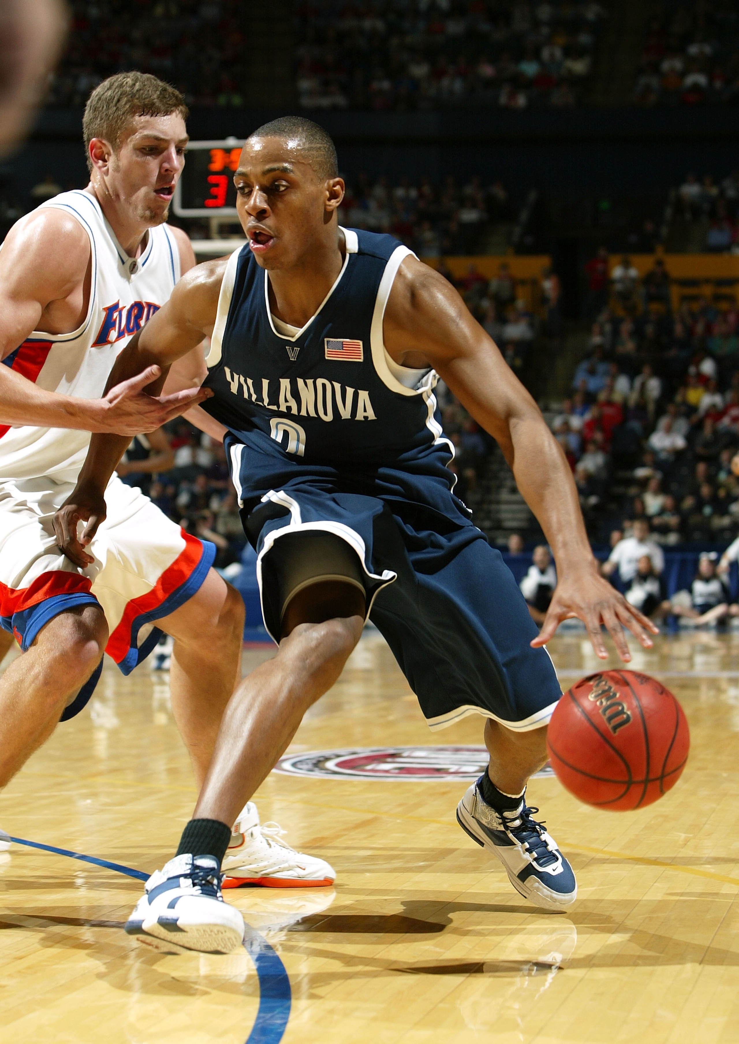 NASHVILLE, TN - MARCH 20:  Randy Foye #2 of the Villanova Wildcats drives past David Lee #24 of the Florida Gators in the second round of the NCAA Division I Men's Basketball Championship at the Gaylord Entertainment Center on March 20, 2005 in Nashville,