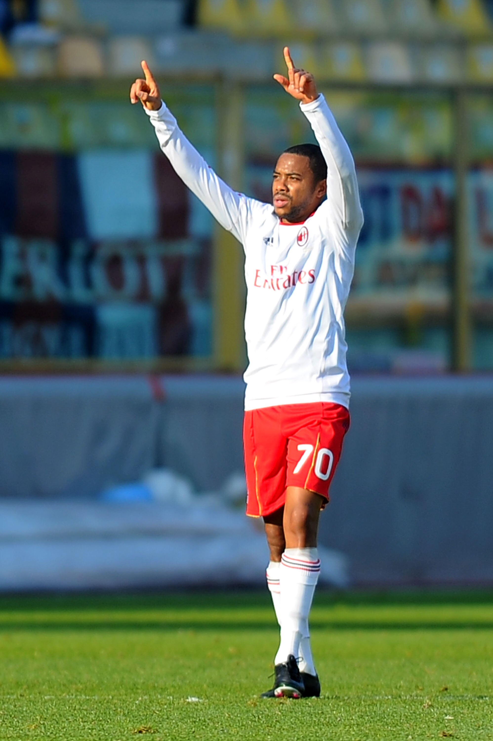 BOLOGNA, ITALY - DECEMBER 12:  Robinho of Milan celebrates after scoring a goal during the Serie A match between Bologna and AC Milan at Stadio Renato Dall'Ara on December 12, 2010 in Bologna, Italy.  (Photo by Roberto Serra/Getty Images)
